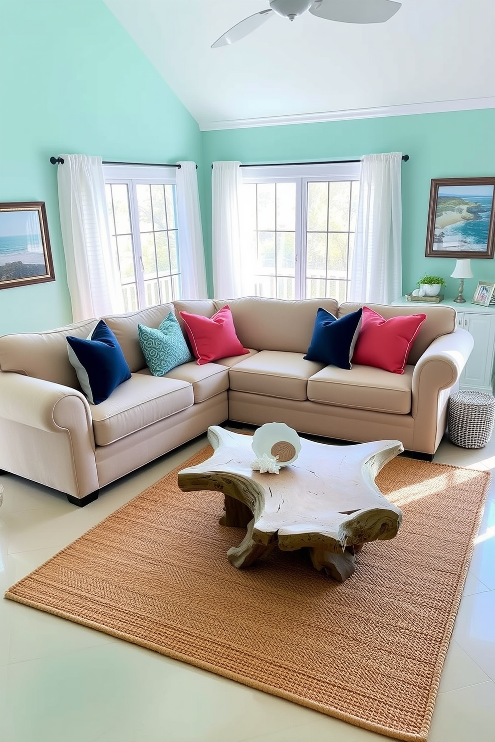 A serene living room setting inspired by the ocean. The walls are painted in soft shades of aqua and seafoam green, complemented by a sandy beige sofa adorned with coral and navy blue throw pillows. Natural light floods the space through large windows dressed with sheer white curtains. A driftwood coffee table sits atop a jute area rug, while coastal artwork and seashell decor add a touch of Florida charm.