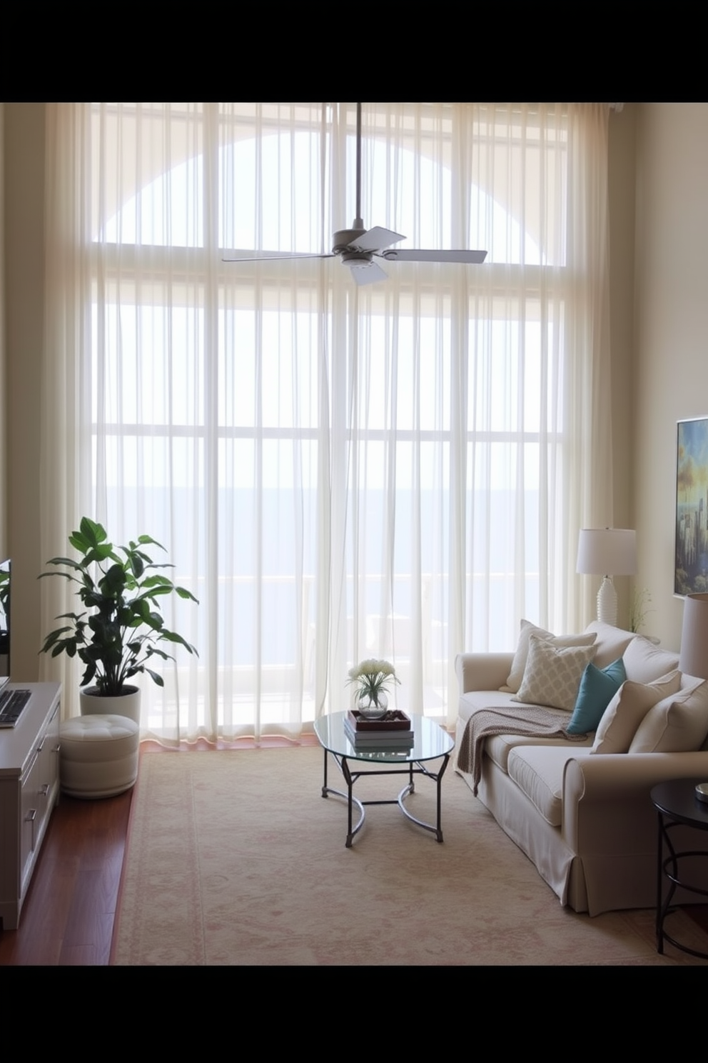 A bright and airy Florida living room features lightweight sheer curtains that gently billow with the breeze, allowing natural light to flood the space. The room is adorned with a comfortable sectional sofa in soft pastel hues, complemented by a large area rug that adds warmth and texture.