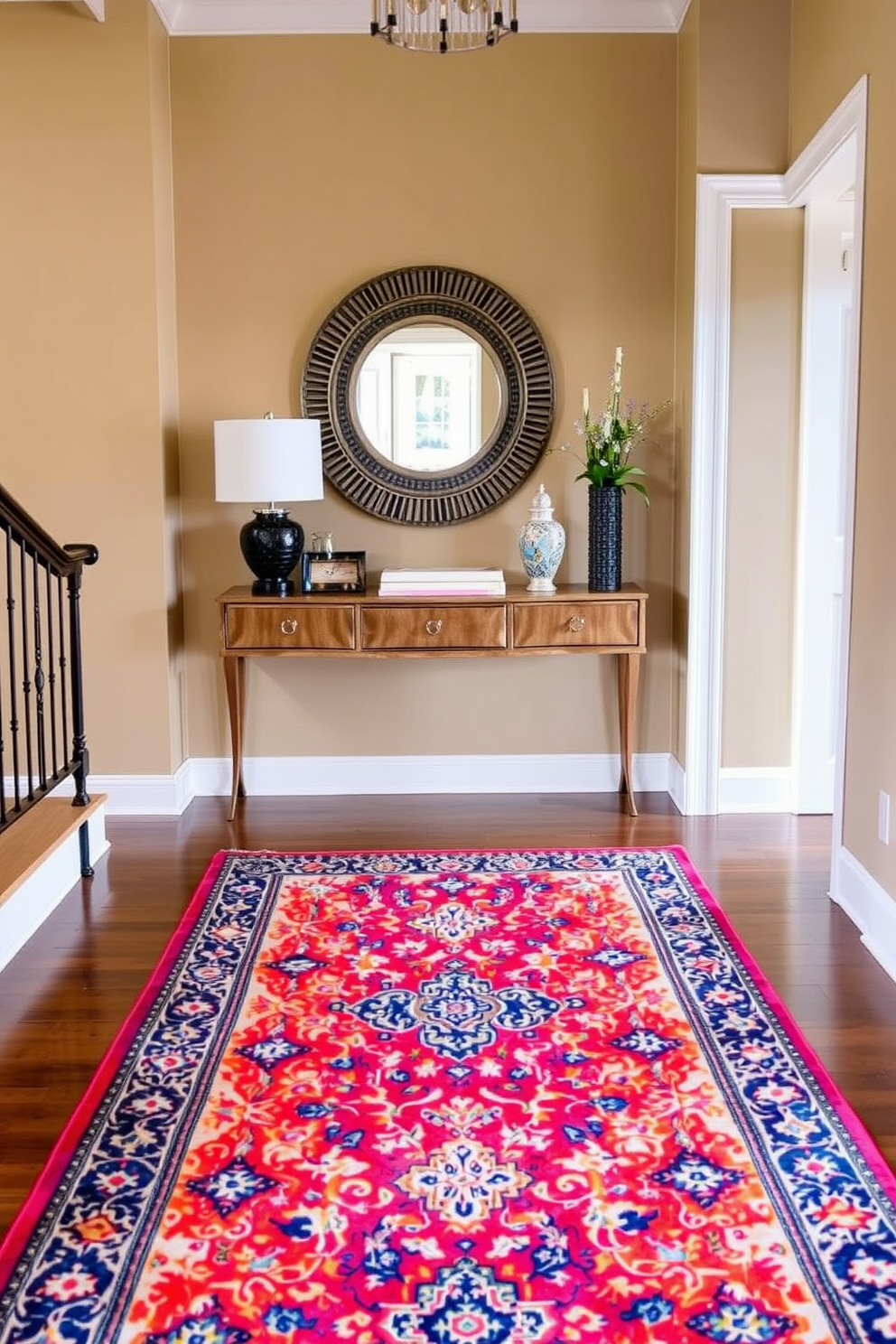 A vibrant area rug anchors the foyer, adding a splash of color and texture to the space. The rug features intricate patterns that complement the surrounding decor, enhancing the overall aesthetic of the entrance. Flanking the rug, a stylish console table holds decorative items and a statement mirror above it. The walls are painted in a warm neutral tone, creating a welcoming atmosphere that invites guests into the home.