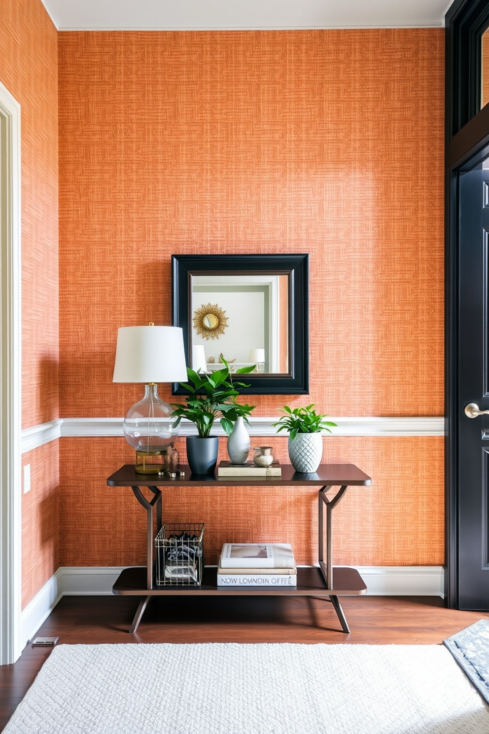 Textured wallpaper in warm tones creates a cozy atmosphere in the foyer. The design features a subtle pattern that adds depth and interest while complementing the natural light streaming in through the entrance. A stylish console table sits against the wall, topped with decorative accents and a mirror that reflects the inviting space. Potted greenery on the table enhances the warmth, making the foyer a welcoming introduction to the home.