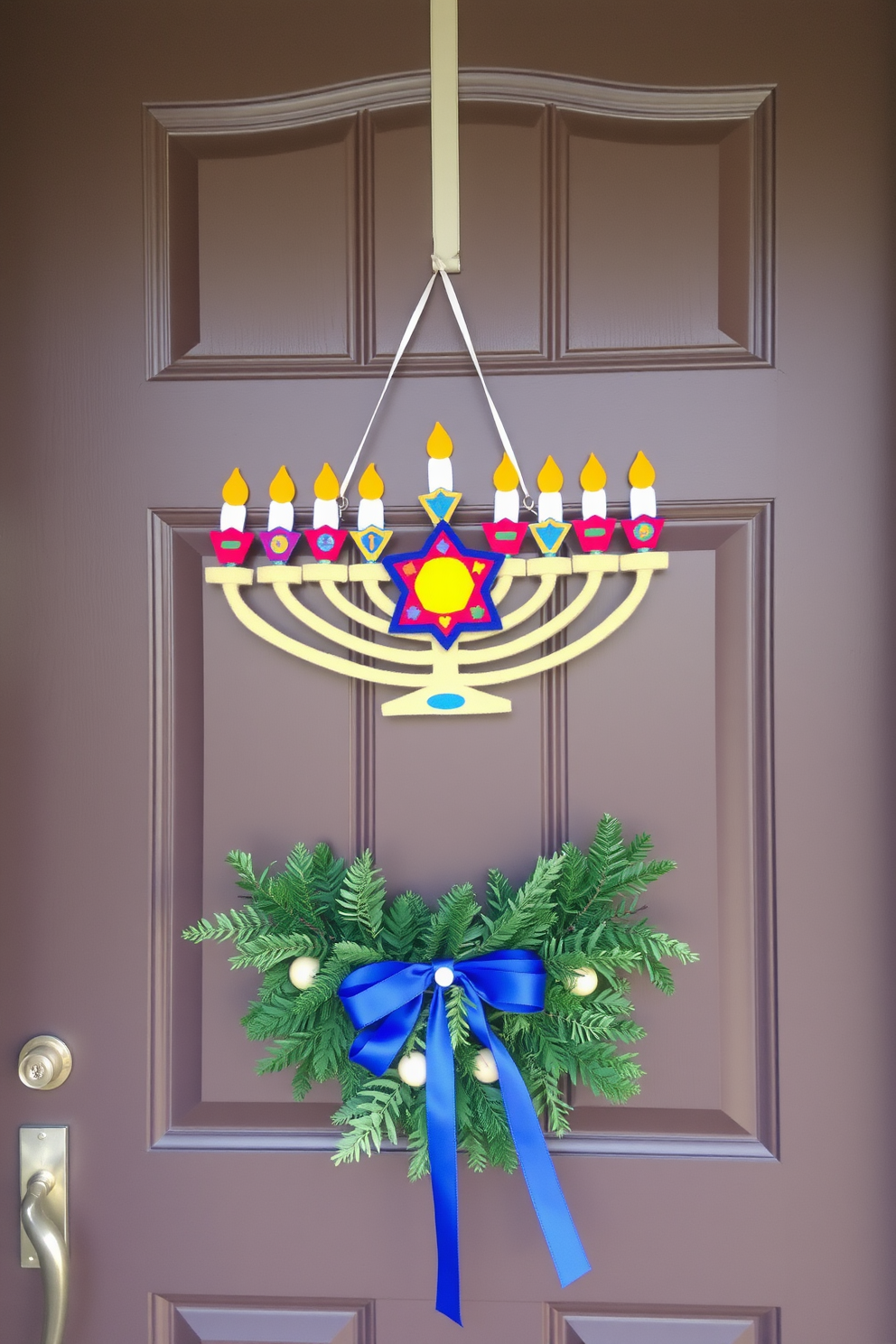 A beautiful front door adorned with a hanging felt menorah, featuring vibrant colors and intricate designs. The menorah is complemented by a festive wreath made of greenery and blue ribbons, creating a warm and inviting entrance for the Hanukkah celebration.