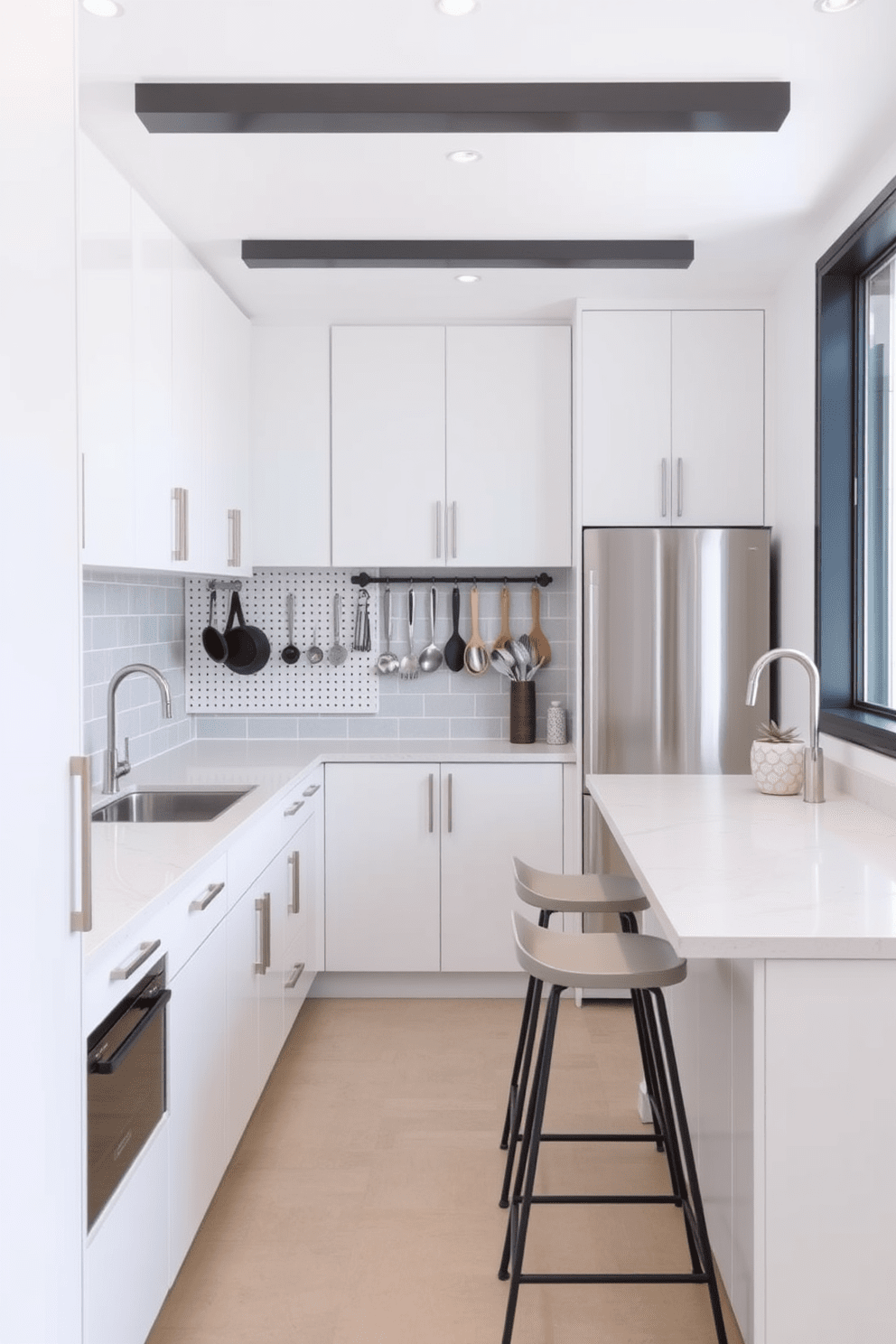 A modern galley kitchen featuring a pegboard installed on one wall for hanging utensils and kitchen tools. The cabinetry is sleek and white, complemented by a subway tile backsplash in a soft gray tone. The countertops are made of durable quartz with a subtle veining pattern. A narrow island with bar stools provides additional seating and workspace, creating a functional yet stylish environment.