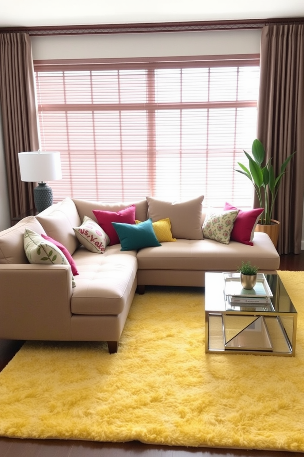 Bright area rug to define the space. The living room features a contemporary sectional sofa in a neutral tone, complemented by colorful throw pillows.