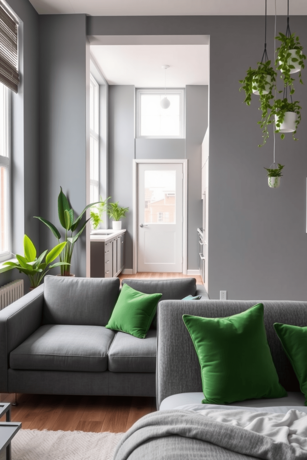 A stylish gray apartment featuring bright green plants that add a vibrant touch to the decor. The living room has a sleek gray sofa paired with a minimalist coffee table, while potted plants are strategically placed near the windows to enhance the natural light. The kitchen showcases gray cabinetry complemented by white countertops, with hanging plants adding freshness. In the bedroom, a gray upholstered bed is accented by green throw pillows, creating a harmonious blend of colors.