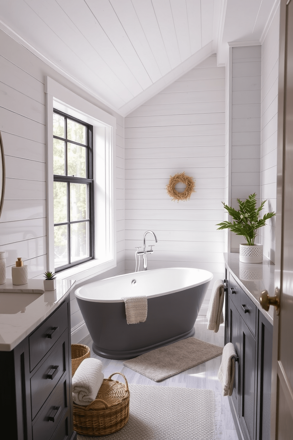 A serene bathroom featuring light gray shiplap walls that add a rustic charm. The space includes a freestanding soaking tub positioned near a large window, allowing natural light to flood in. A sleek gray vanity with a white quartz countertop complements the overall aesthetic. Decorative elements such as potted plants and soft towels enhance the cozy atmosphere.