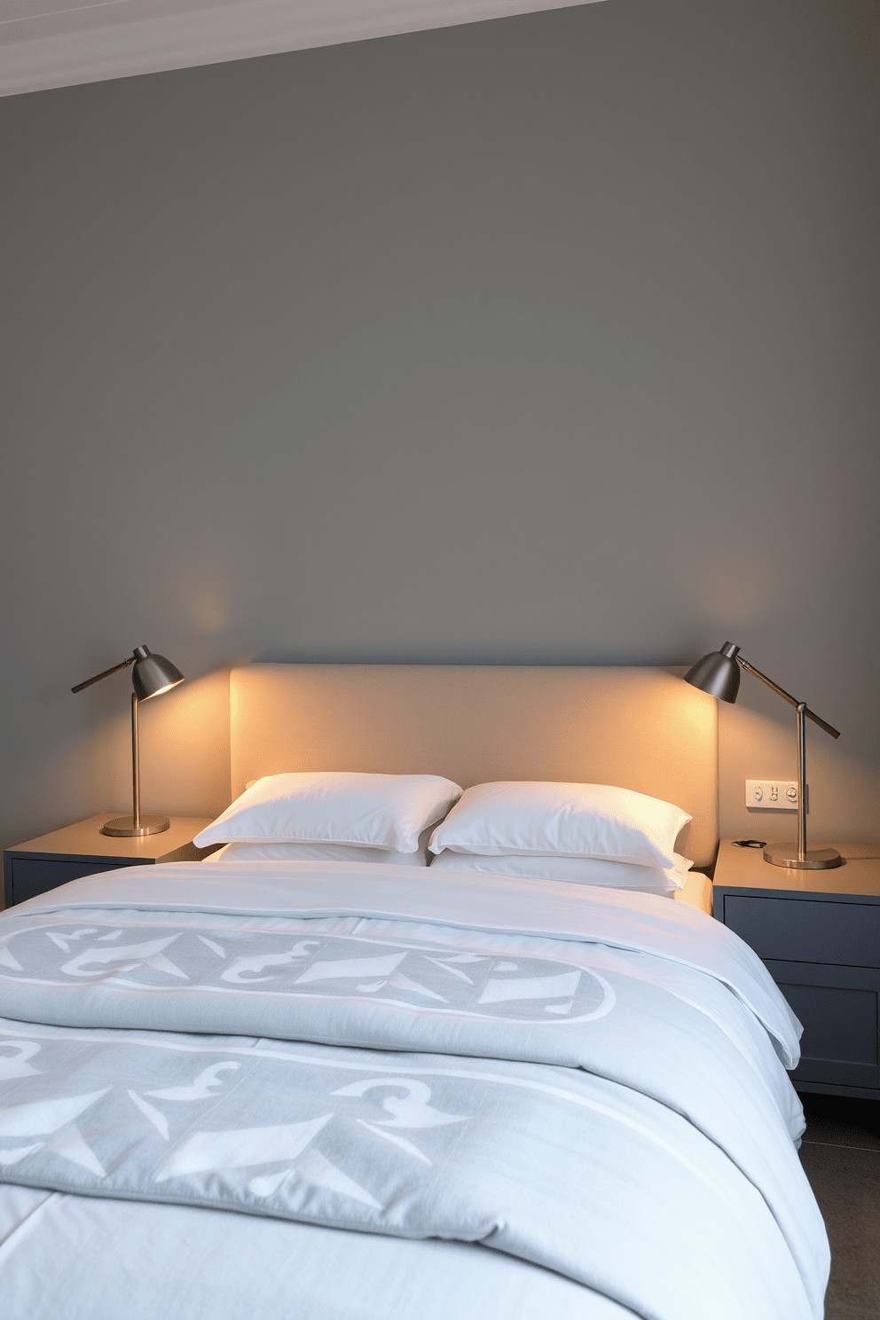 A modern gray bedroom featuring stylish gray nightstands on either side of a plush bed. Each nightstand is topped with sleek lamps that provide a warm, inviting glow, enhancing the room's contemporary aesthetic.