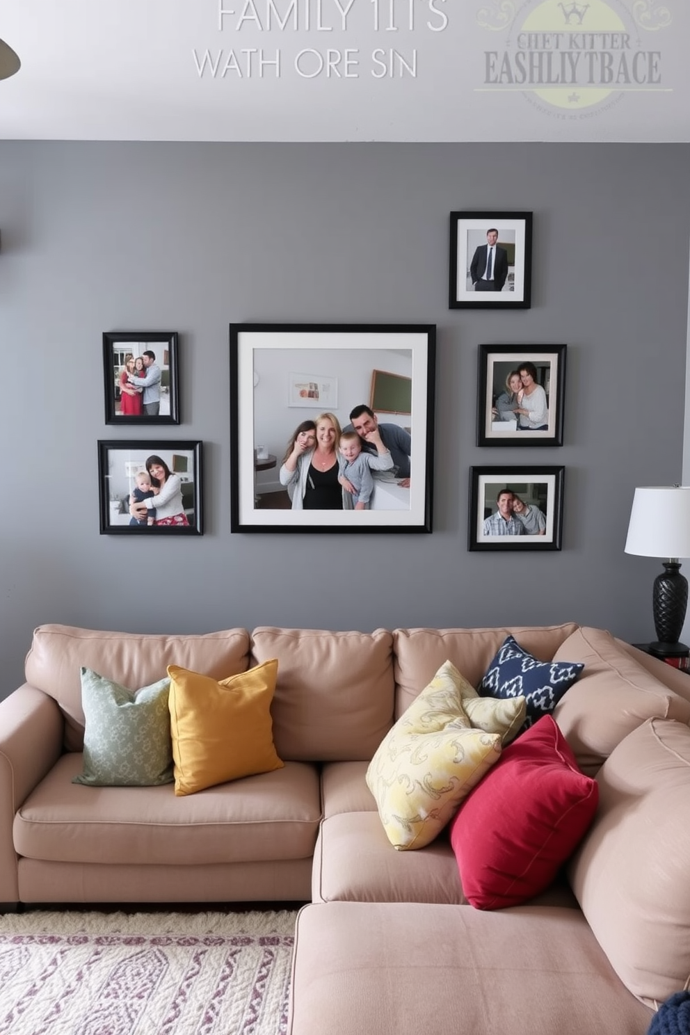 A cozy family room featuring a gray accent wall adorned with framed family photos showcasing cherished memories. The room is furnished with a plush sectional sofa in a neutral tone, complemented by colorful throw pillows that add warmth and personality.