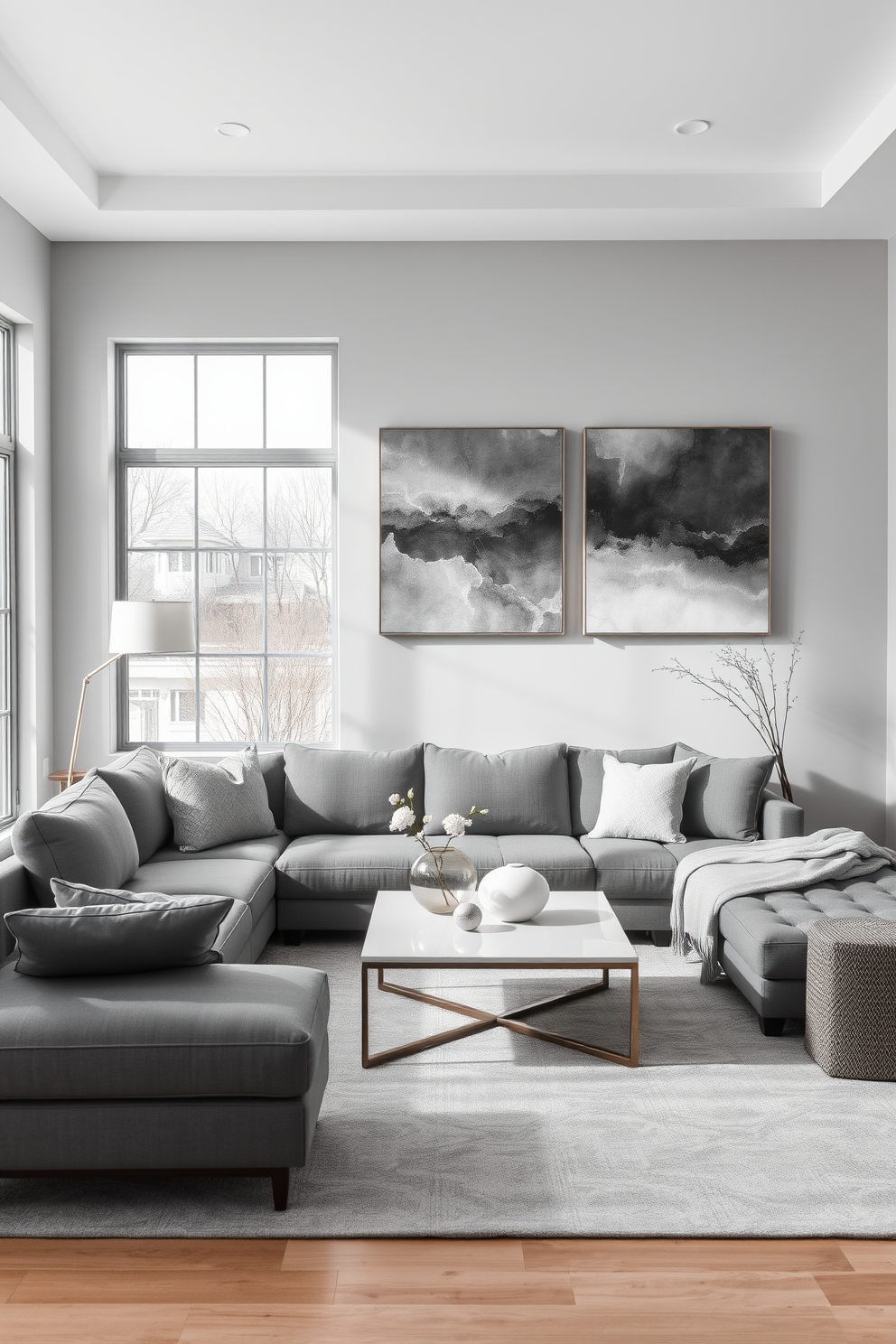 A minimalist family room featuring gray wall art that adds a touch of sophistication. The space includes a sleek gray sofa paired with a simple white coffee table, creating a calm and inviting atmosphere. Natural light floods the room through large windows, highlighting the subtle textures of the gray accents. A soft area rug in a lighter shade anchors the seating area, enhancing the minimalist aesthetic.