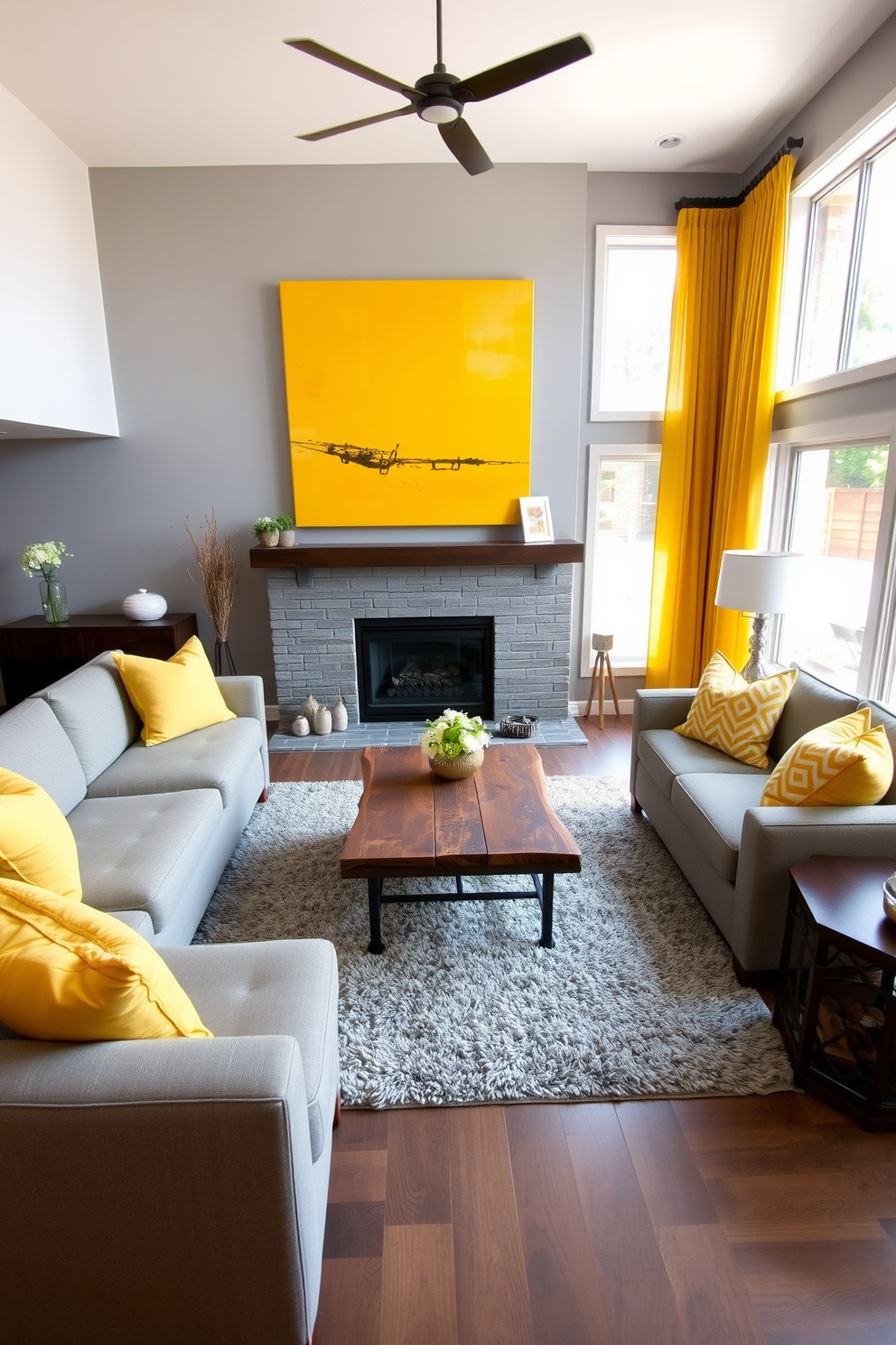 A cozy family room featuring a gray sectional sofa adorned with yellow accent pillows. The walls are painted in a soft gray, complemented by a large yellow abstract painting above the fireplace. A stylish coffee table made of reclaimed wood sits in the center, surrounded by a plush area rug in gray tones. Floor-to-ceiling windows allow natural light to flood the space, highlighting the warm hues of the yellow curtains.