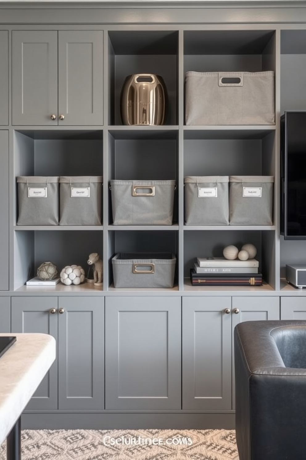 A stylish gray game room featuring sleek storage bins for organization. The bins are neatly arranged on open shelves, complementing the modern furniture and decor.