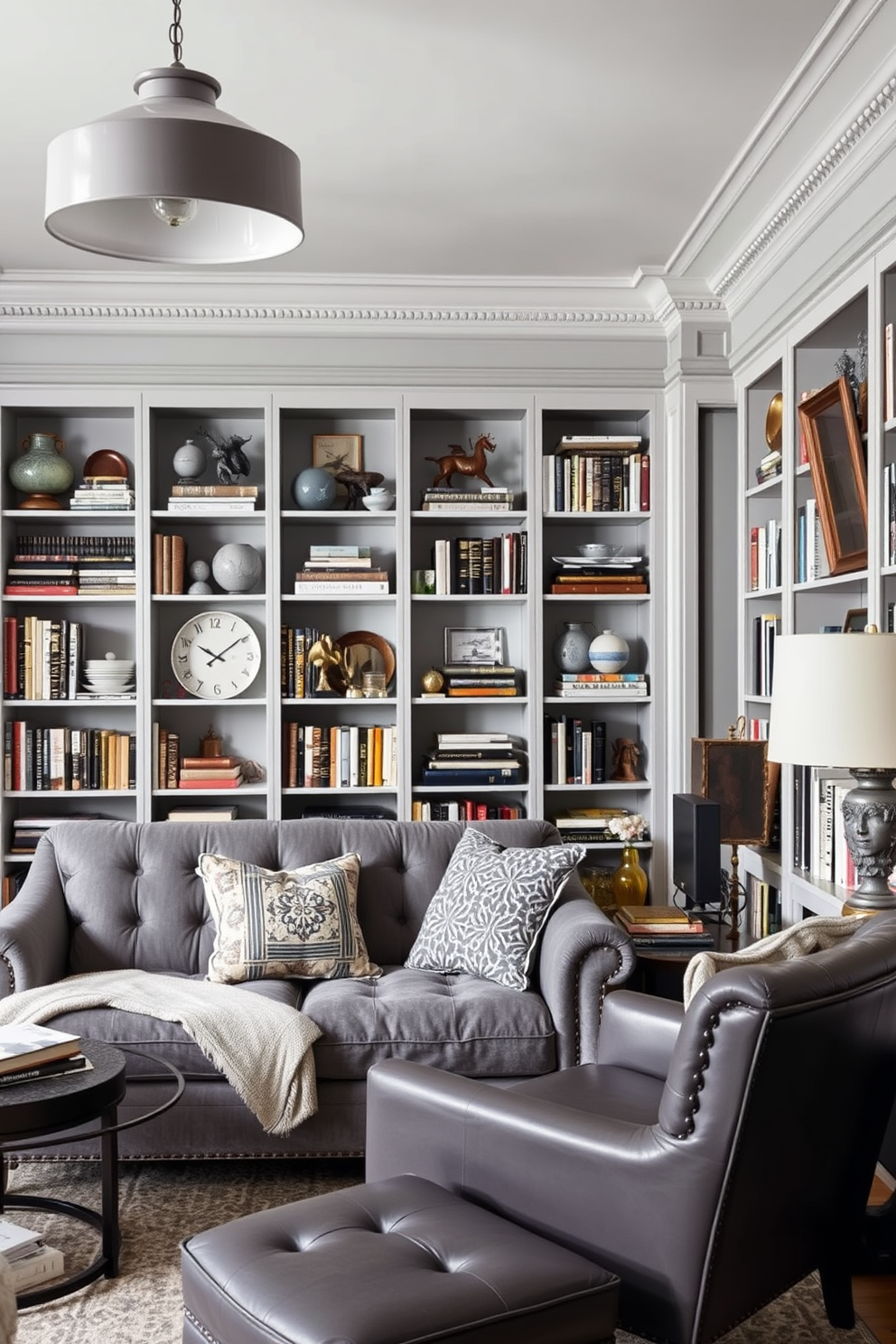 An eclectic home library filled with various gray furniture styles. The space features a comfortable gray velvet sofa paired with a sleek gray leather armchair, creating a cozy reading nook. Bookshelves line the walls, showcasing a mix of vintage and modern gray decor items. Soft gray lighting fixtures hang from the ceiling, illuminating the room and enhancing its inviting atmosphere.