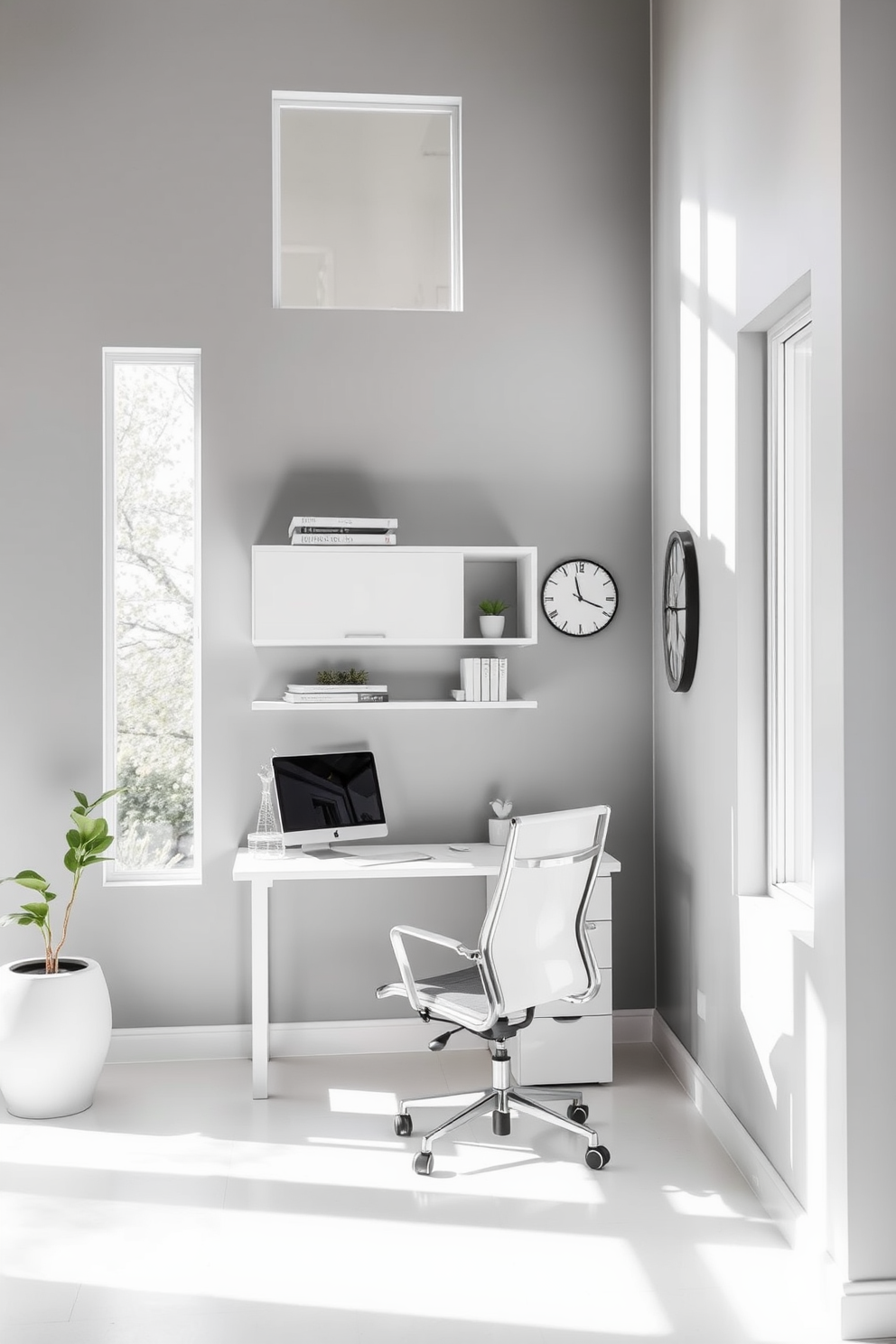 Bright gray paint adorns the walls, creating a serene and modern atmosphere. A sleek white desk is positioned against the wall, complemented by a stylish ergonomic chair and organized shelving above. Natural light floods the space through large windows, enhancing the bright and airy feel. Decorative accents like a potted plant and a minimalist clock add personality to the office while maintaining a clean aesthetic.