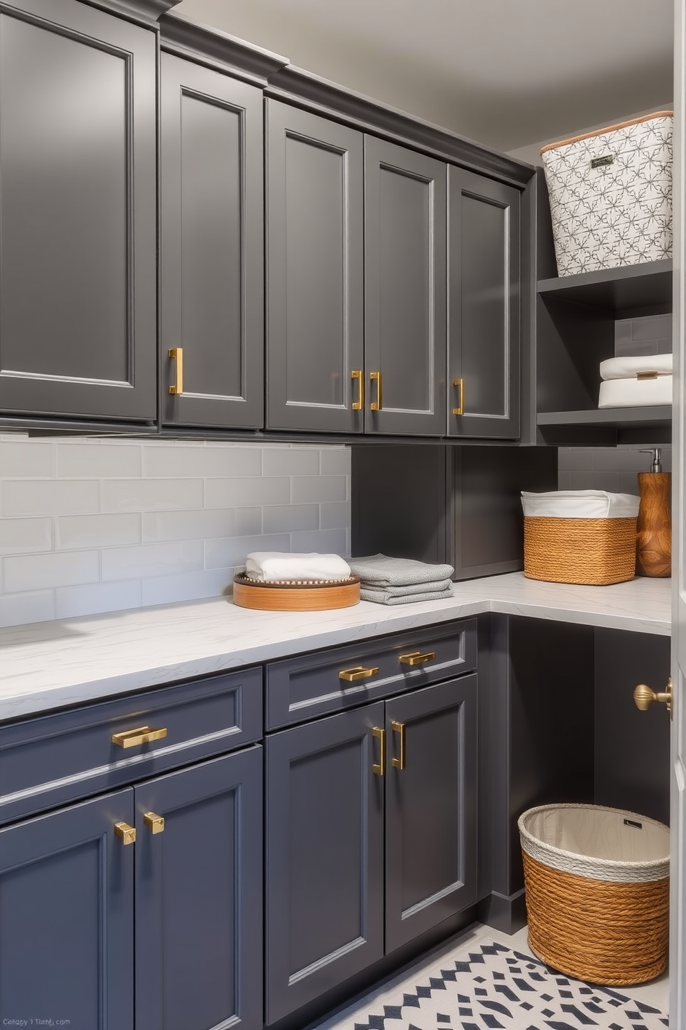 A chic laundry room featuring dark gray cabinets accented with elegant brass hardware. The space is well-organized, with a stylish countertop for folding clothes and ample storage for laundry essentials.