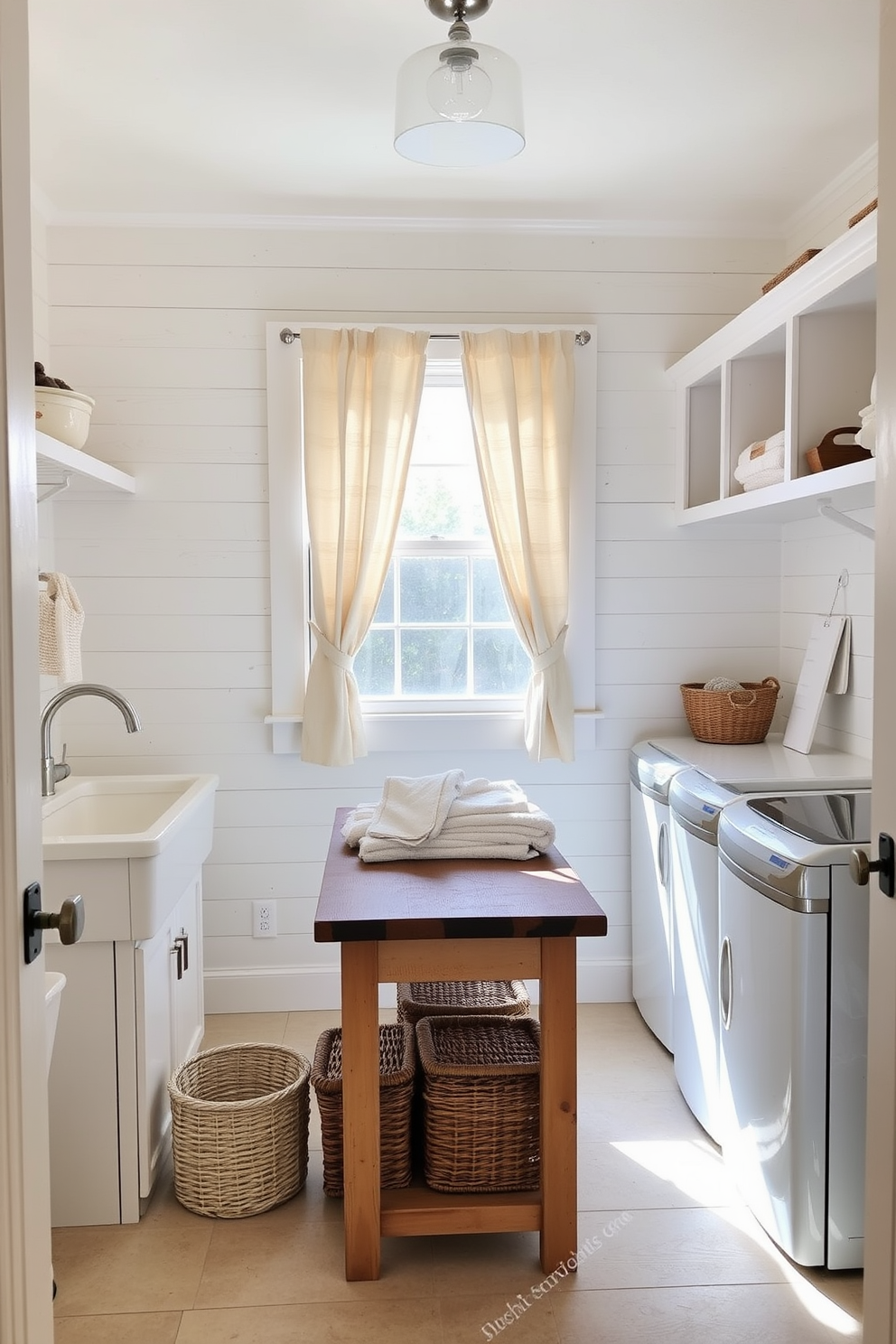 A cozy farmhouse laundry room featuring shiplap walls painted in a soft white hue. The space includes a large farmhouse sink with a brushed nickel faucet and open shelving above for storage and decor. In the center, there is a rustic wooden table for folding clothes, surrounded by woven baskets for organization. Natural light streams in through a window adorned with simple linen curtains, creating a warm and inviting atmosphere.