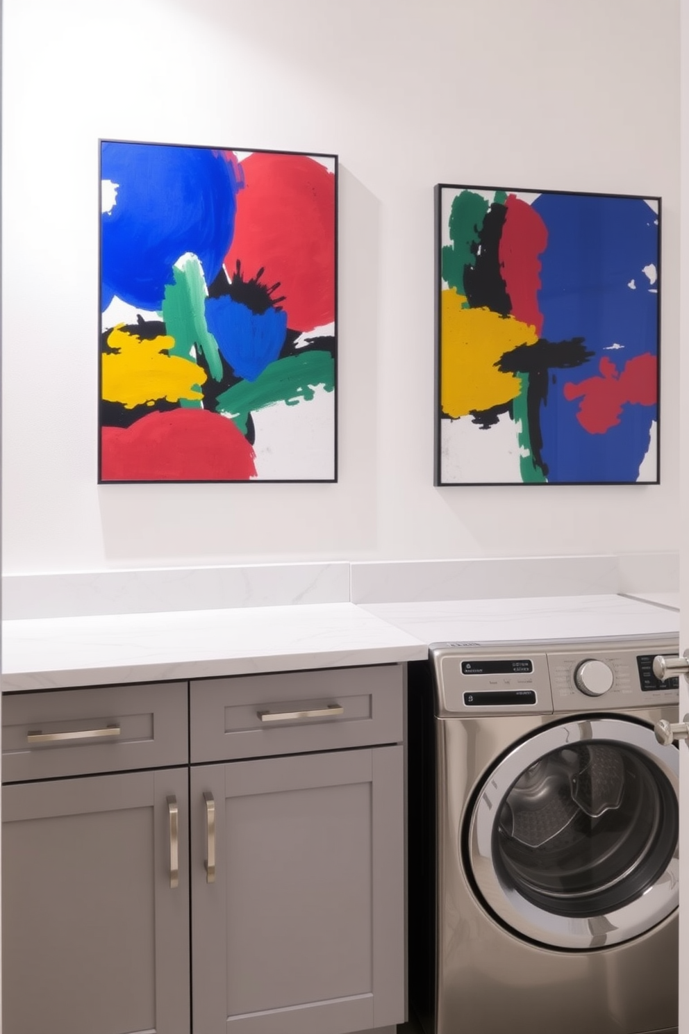 Bright artwork to liven up space. The walls are adorned with vibrant abstract paintings that add a pop of color to the otherwise neutral palette. Gray Laundry Room Design Ideas. The cabinetry is a soft gray with sleek handles, complemented by a stylish countertop that offers ample workspace for laundry tasks.