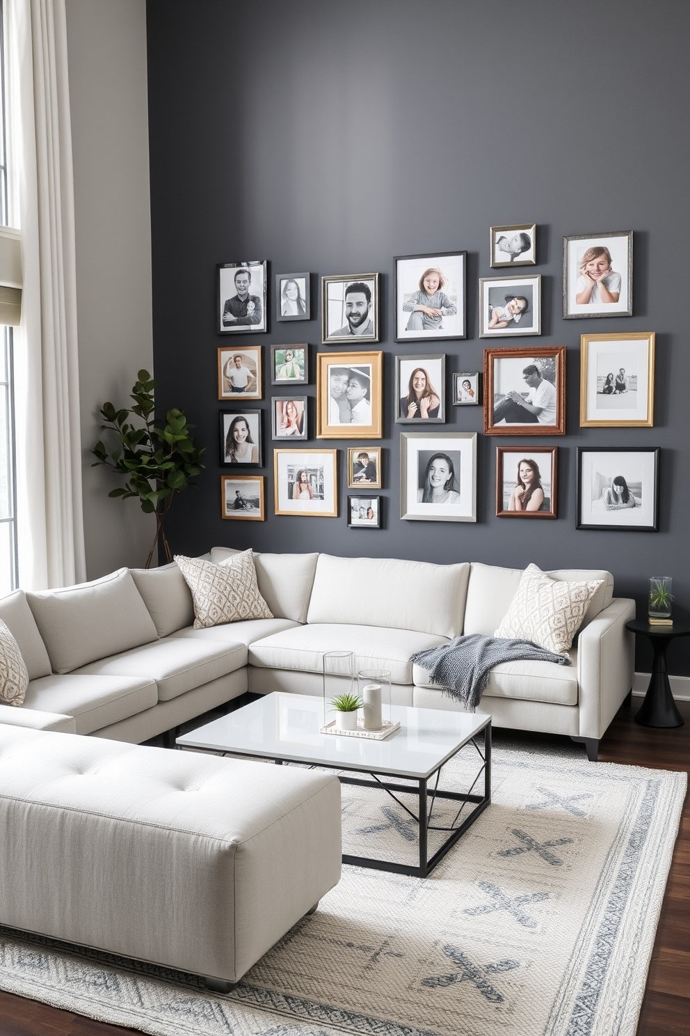 A modern gray living room features a striking accent wall adorned with a curated collection of family photos in various frames. The space is complemented by a plush sectional sofa in a light fabric, paired with a sleek coffee table and a textured area rug that adds warmth to the room.