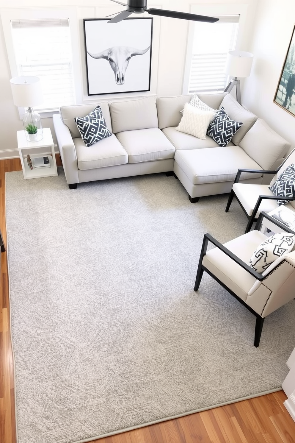 A soft gray area rug with geometric patterns anchors the living room, providing a cozy yet modern touch. Surrounding the rug, a plush sectional sofa in a complementary shade invites relaxation, while sleek accent chairs add a stylish contrast.