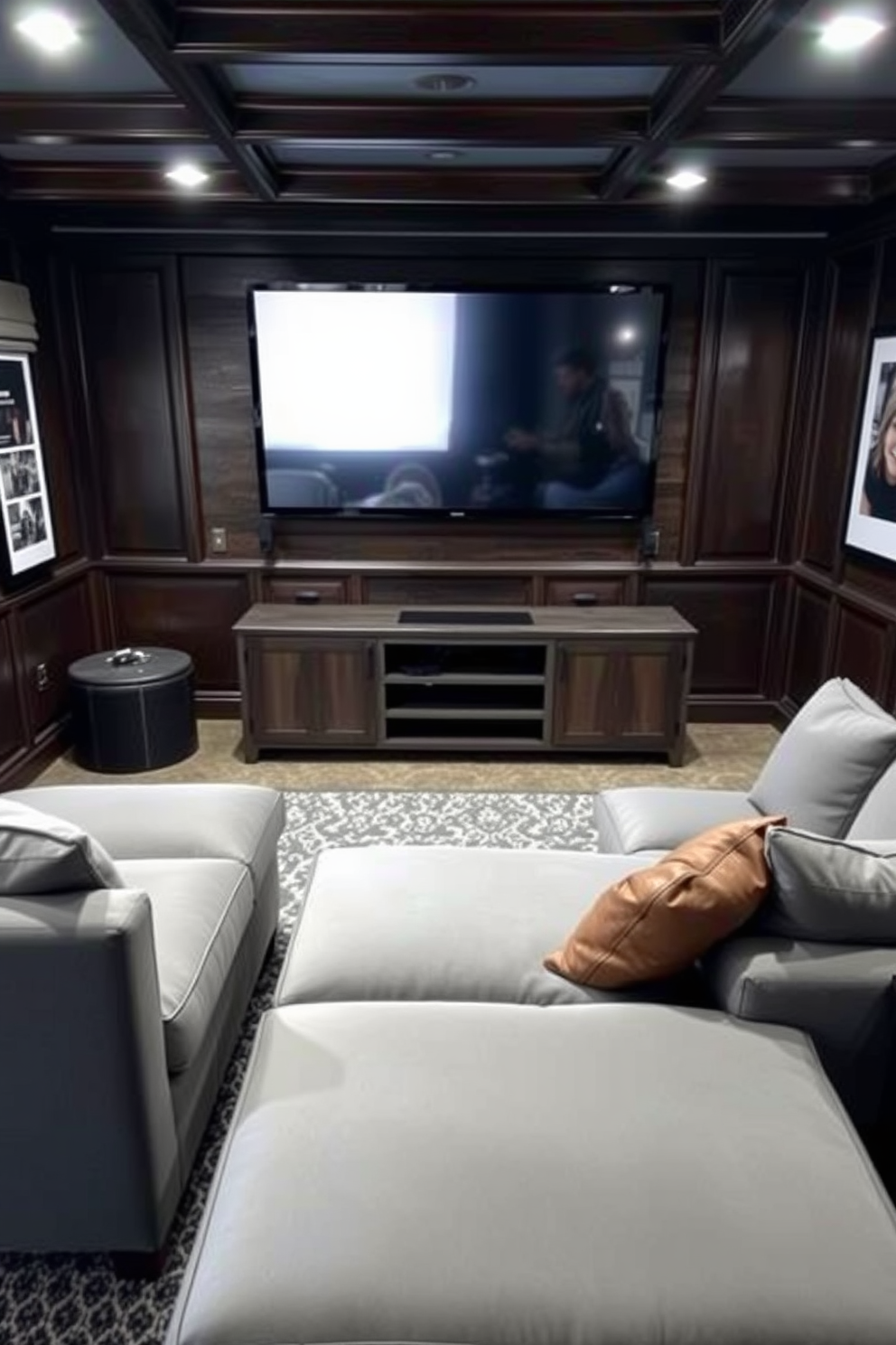 A cozy man cave featuring a soft gray sectional sofa that invites relaxation. The walls are adorned with dark wood paneling, and a large flat-screen TV is mounted above a sleek media console.