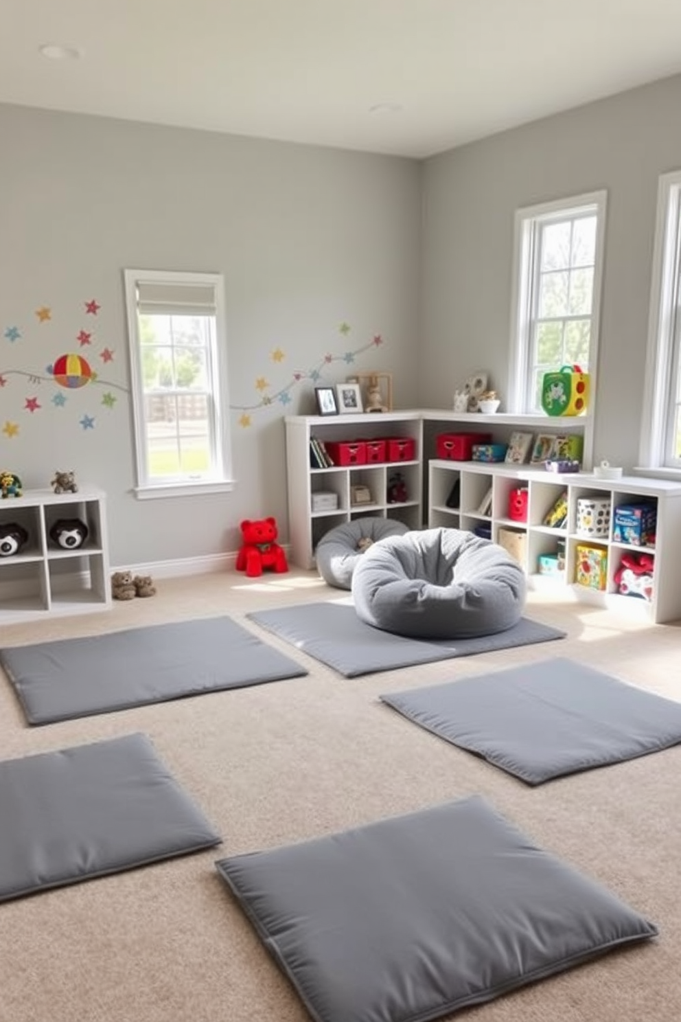 A cozy playroom featuring padded gray play mats that provide a safe and soft surface for children to play. The walls are painted in a light gray hue, complemented by colorful wall decals that add a playful touch to the space. In one corner, a plush gray bean bag chair invites relaxation and reading time. Natural light floods the room through large windows, enhancing the cheerful atmosphere and showcasing vibrant toys neatly arranged on open shelving.