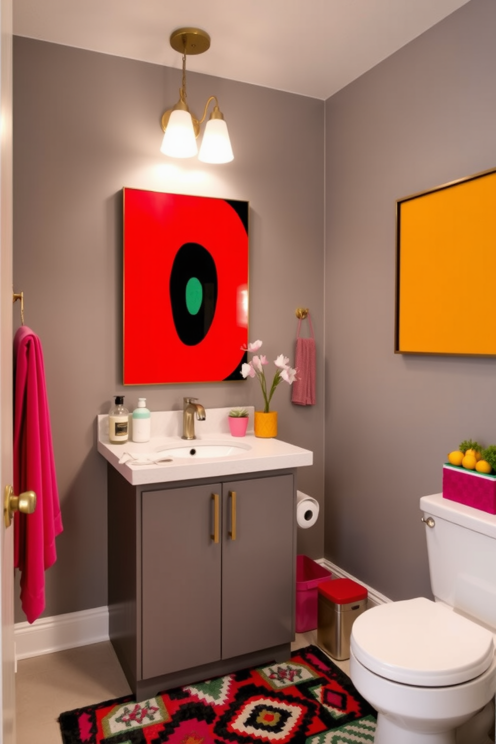 A chic powder room featuring neutral gray tones complemented by vibrant accents. The walls are painted a soft gray, while bold artwork in bright colors hangs above a sleek gray vanity. The vanity is topped with a striking countertop in a contrasting hue, showcasing a modern sink. A colorful rug adds warmth to the space, and decorative accessories in vibrant shades are strategically placed throughout the room.