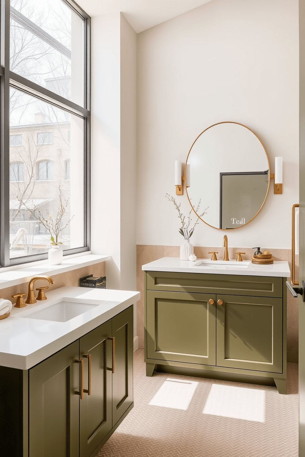 A modern bathroom featuring olive green cabinetry that adds a contemporary flair. The space is complemented by sleek white countertops and gold fixtures that enhance the overall elegance. Natural light floods the room through large windows, highlighting the textured tiles in soft earth tones. A statement mirror with a minimalist design reflects the stylish decor, creating a sense of openness and tranquility.