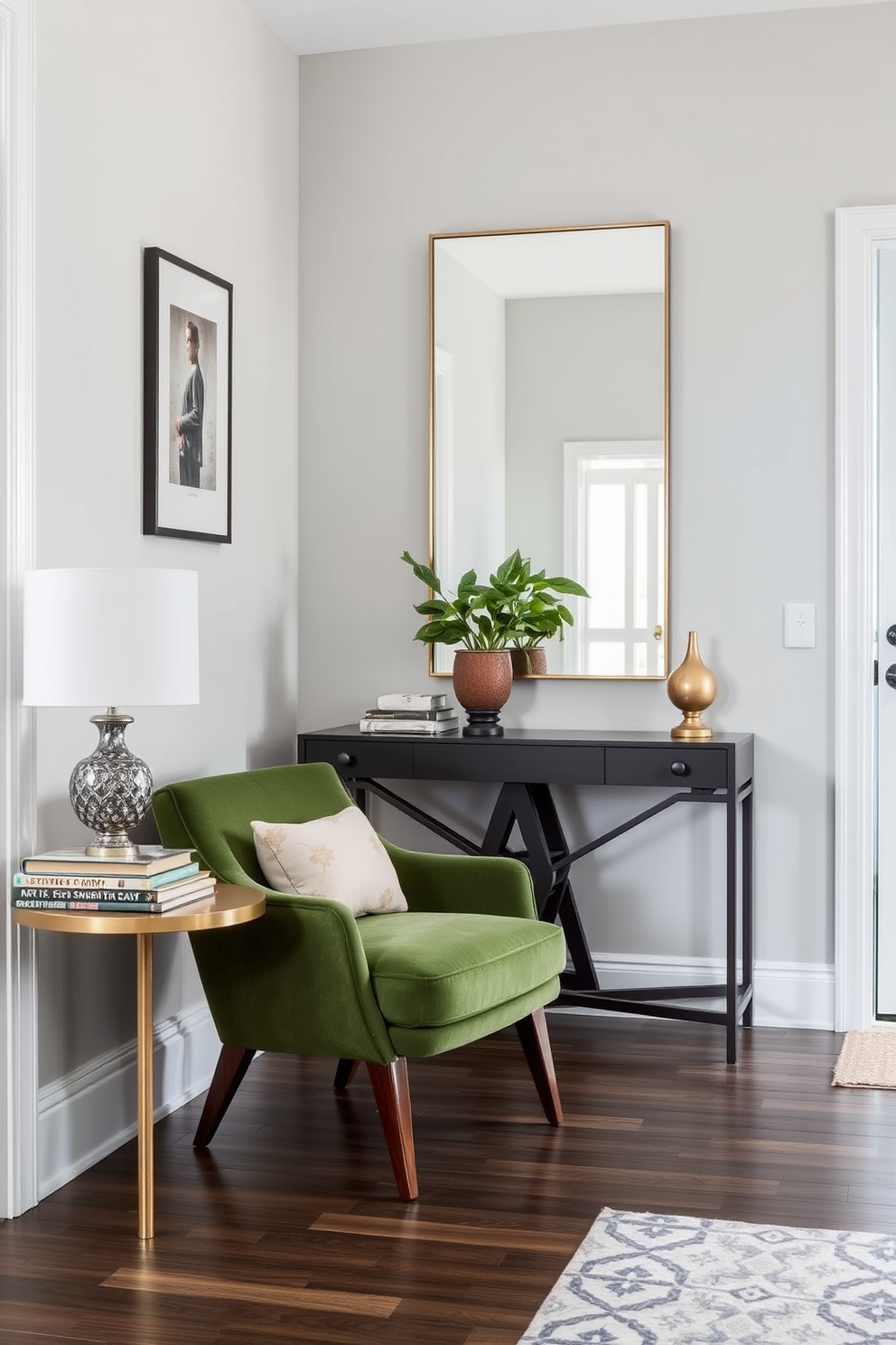 A stylish green accent chair is placed in a cozy corner, featuring plush upholstery and elegant wooden legs. The chair is complemented by a small side table adorned with a decorative lamp and a stack of art books. The foyer is designed with a modern aesthetic, showcasing a statement console table against a light gray wall. A large mirror hangs above the table, reflecting natural light and enhancing the space's openness.