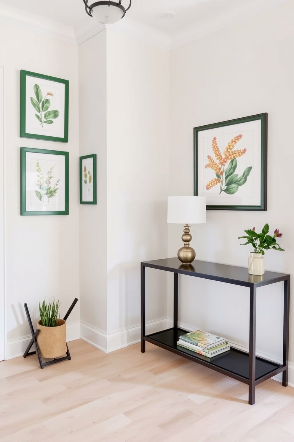 A welcoming foyer adorned with botanical prints in green frames creates an inviting atmosphere. The walls are painted in a soft neutral tone, allowing the vibrant artwork to stand out beautifully. A stylish console table sits against one wall, topped with a decorative lamp and a small potted plant. The floor features a light-colored hardwood, enhancing the airy feel of the space.