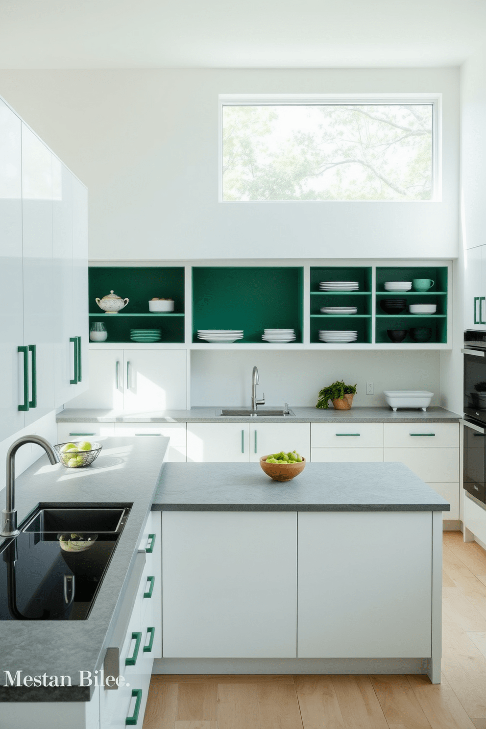 A minimalist kitchen featuring forest green accents. The cabinets are a soft white, complemented by forest green handles and open shelving displaying stylish dishware. The countertops are a sleek gray stone, and a large island in the center provides additional workspace. Natural light floods the room through a large window, highlighting the simple yet elegant design.