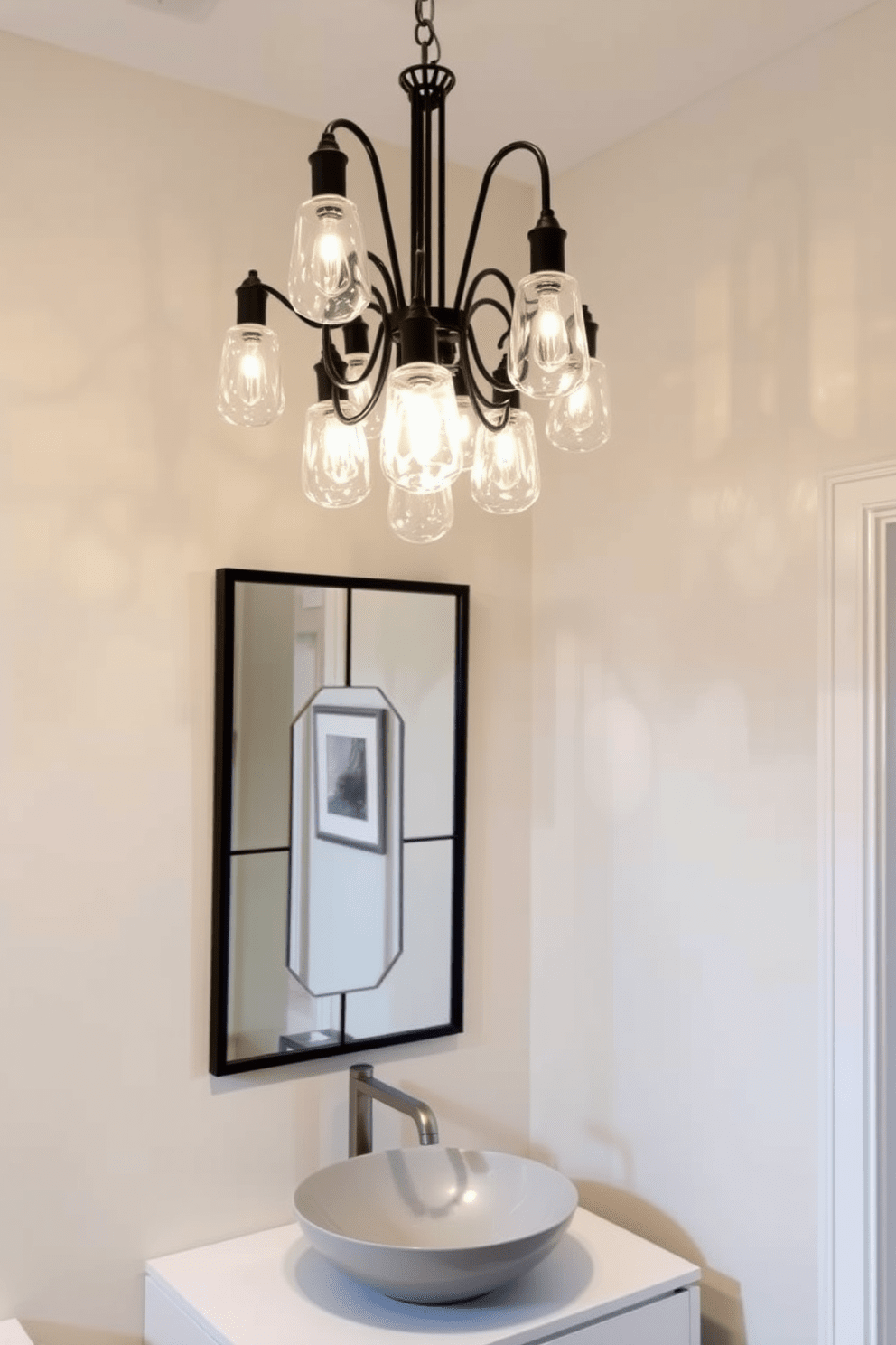 A guest bathroom featuring unique lighting fixtures that add character. The space includes a statement chandelier made of glass and metal, casting a warm glow throughout the room. The walls are adorned with soft, neutral tones to complement the lighting. A sleek, modern vanity with a vessel sink sits beneath a decorative mirror, enhancing the overall elegance of the design.