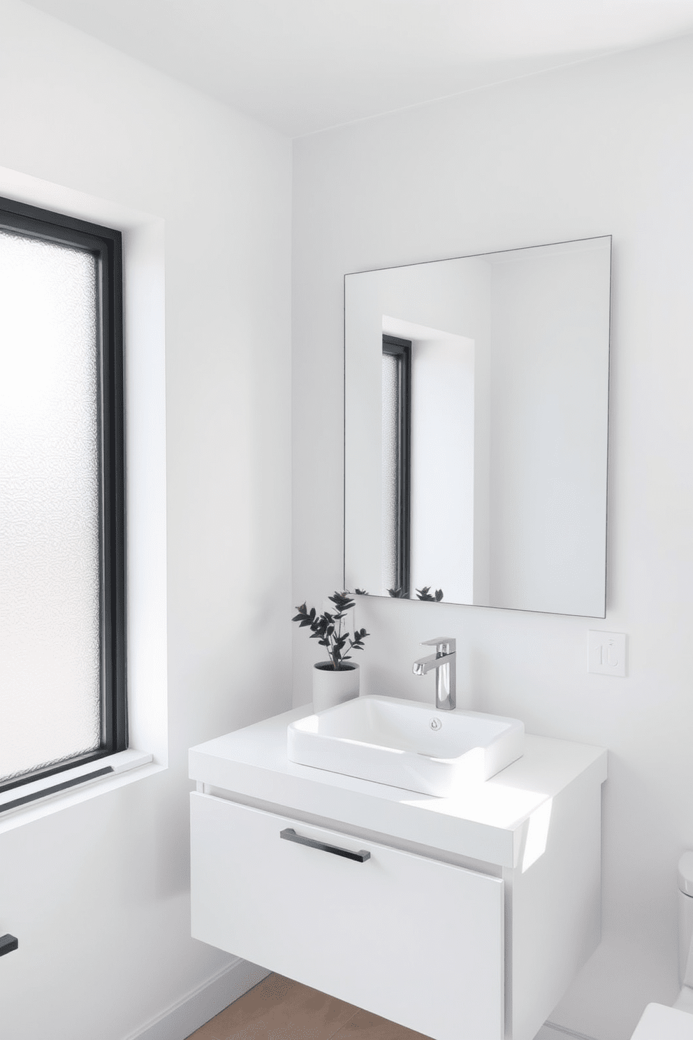 A guest bathroom featuring minimalist decor with a clean aesthetic. The walls are painted in a soft white, complemented by a simple floating vanity with a sleek sink and a large frameless mirror above it. Natural light floods the space through a frosted glass window, creating a bright and airy atmosphere. A single potted plant sits on the countertop, adding a touch of greenery without overwhelming the simplicity of the design.