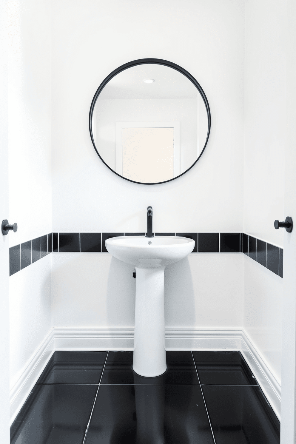 A sleek half bathroom featuring a striking black and white color scheme. The walls are painted in a crisp white, while the floor showcases bold black tiles with a glossy finish. A modern pedestal sink with a minimalist design is centered against the wall, complemented by a sleek black faucet. Above the sink, a large round mirror with a thin black frame adds depth and elegance to the space.