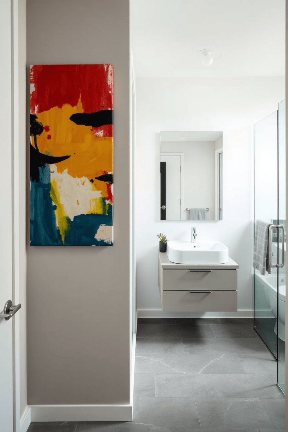 Artistic wall art to personalize space. A large abstract painting in vibrant colors hangs prominently on the wall, adding energy and character to the room. Hallway bathroom design ideas. The bathroom features sleek contemporary fixtures and a minimalist design, with a floating vanity and a glass shower enclosure that enhance the feeling of spaciousness.