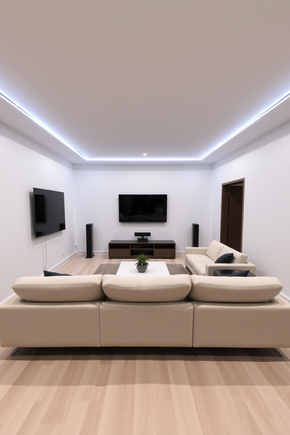 A modern minimalist game room layout features sleek furniture with clean lines and a neutral color palette. The space includes a low-profile sectional sofa facing a wall-mounted flat-screen TV, with a minimalist coffee table in the center. To enhance the gaming experience, there are strategically placed LED lights that create an ambient glow. The flooring is a light wood finish, complementing the overall airy and uncluttered aesthetic of the room.