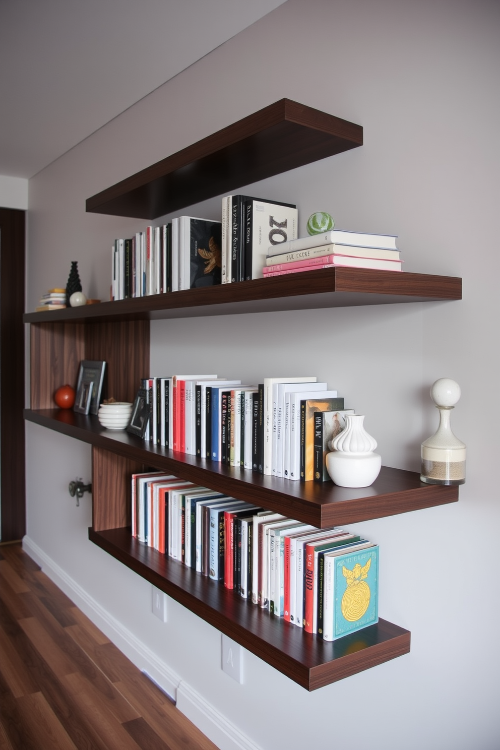 A modern home library featuring sleek floating shelves made of dark wood. The shelves are adorned with a curated collection of books and decorative items, creating a stylish and inviting atmosphere.