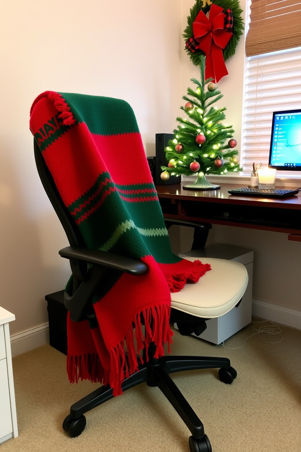 A cozy home office adorned with Christmas spirit. A festive throw blanket in vibrant red and green is draped over a stylish ergonomic chair, adding warmth to the workspace. The desk is decorated with a small evergreen tree, twinkling fairy lights, and a few ornaments. A scented candle sits nearby, creating a welcoming atmosphere for productivity during the holiday season.