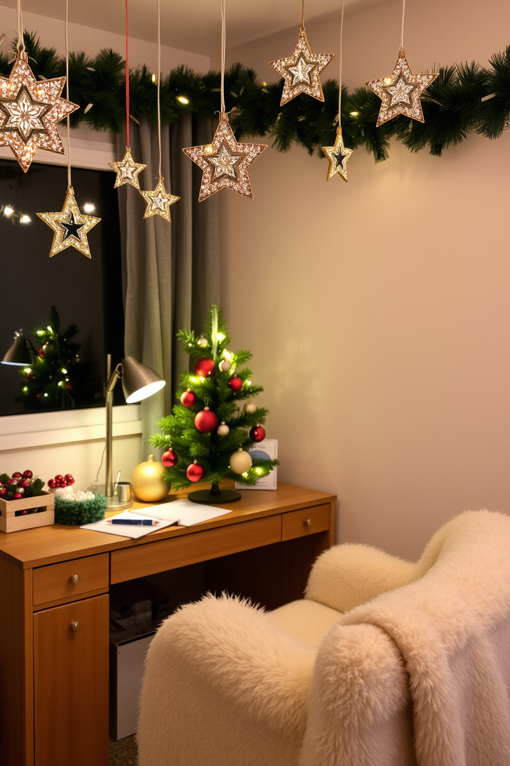 A cozy home office decorated for Christmas. Glittery star ornaments hang from the ceiling lights, adding a festive sparkle to the space. The desk is adorned with a small evergreen tree, twinkling lights, and a collection of colorful ornaments. A plush chair is draped with a soft throw blanket, creating an inviting atmosphere for holiday work sessions.