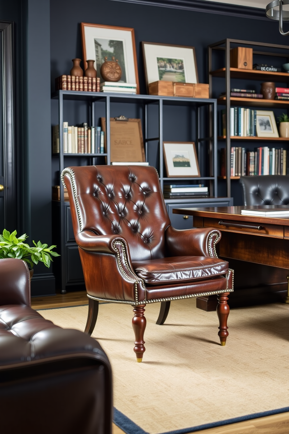 A vintage leather chair sits elegantly in a well-appointed home office, exuding both comfort and style. The chair features deep brown leather with a distressed finish, complemented by polished wooden legs and brass accents. The office is designed with a masculine aesthetic, showcasing a rich color palette of navy and charcoal. A large wooden desk anchors the space, paired with industrial-style shelving that displays books and personal artifacts.