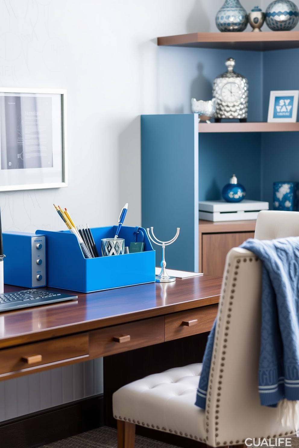 A stylish home office featuring blue and silver desk accessories. The desk is adorned with a sleek blue organizer and silver pen holder, creating a harmonious and festive workspace for Hanukkah. The walls are decorated with subtle blue accents, complemented by silver decorative items on the shelves. A cozy chair sits beside the desk, draped with a soft blue throw blanket, enhancing the inviting atmosphere for holiday creativity.