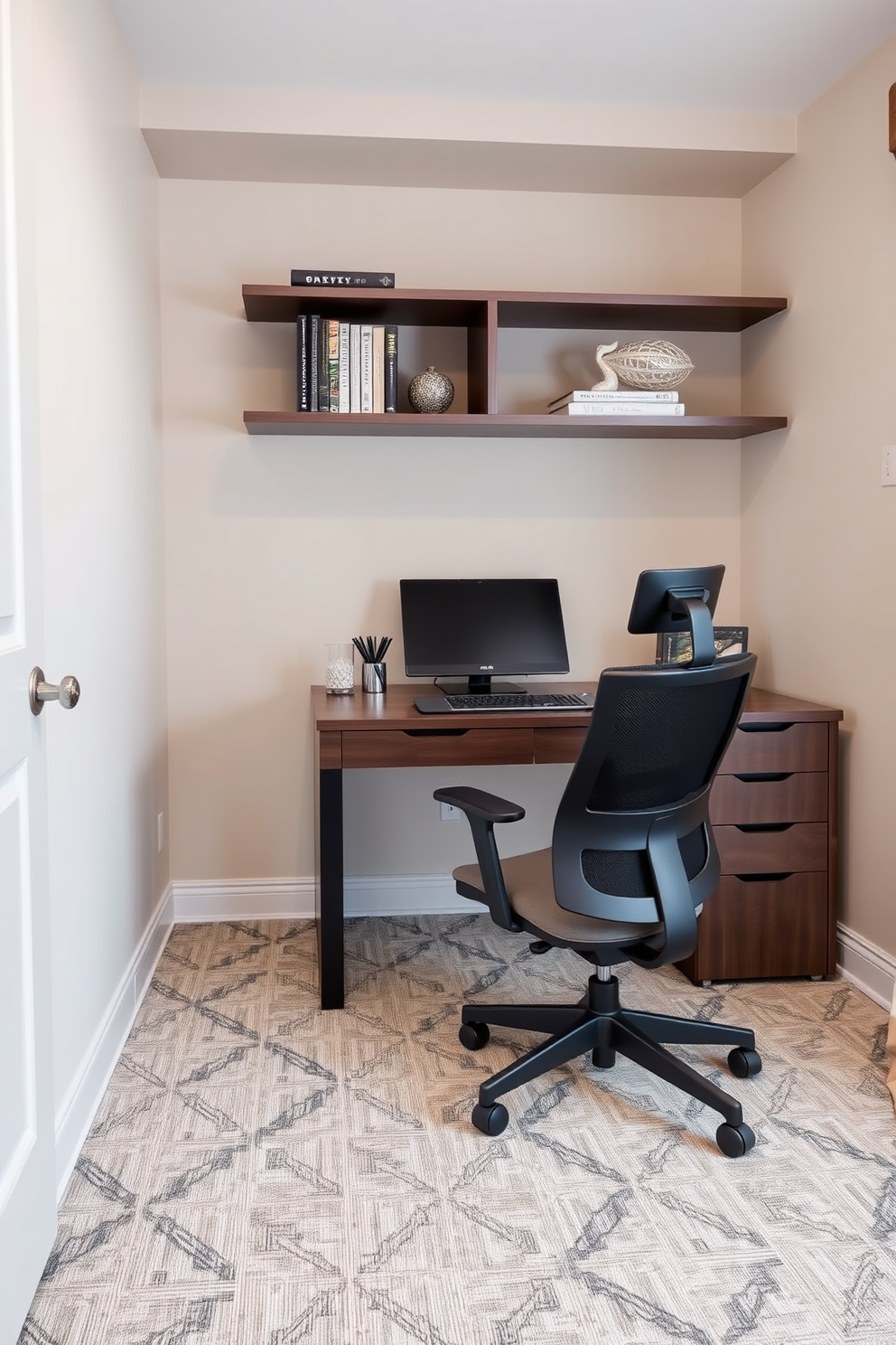 A sleek home office designed with a neutral palette creates a professional atmosphere. The walls are painted in soft beige, and the carpet features a subtle geometric pattern in shades of gray and cream. A modern wooden desk is positioned against the wall with a comfortable ergonomic chair. Shelves above the desk hold neatly organized books and decorative items, enhancing the sophisticated look of the space.