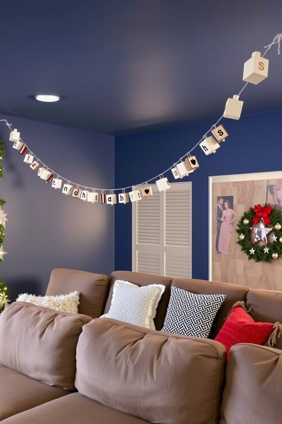 A festive home theater setting adorned with a DIY dreidel garland strung across the ceiling. The walls are painted in a deep blue hue, creating a cozy atmosphere, while plush seating invites family and friends to gather and enjoy the holiday spirit.