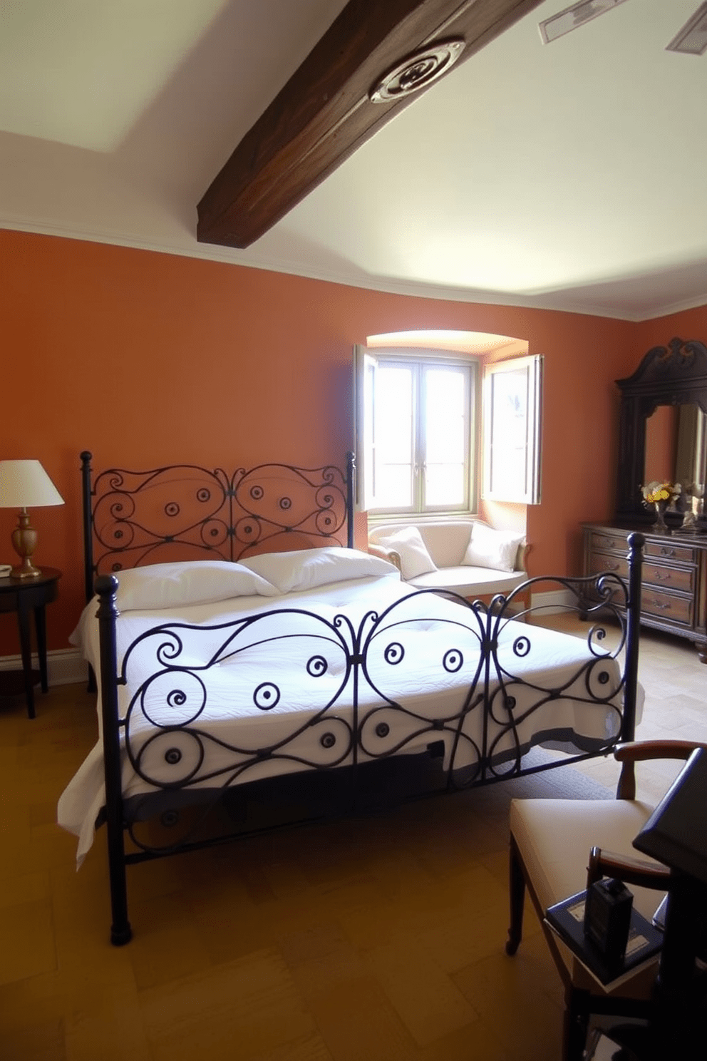 A serene Italian bedroom features an elegant wrought iron bed frame with intricate scrollwork and a plush mattress adorned with soft linens. The walls are painted in warm earthy tones, complemented by rustic wooden beams and a cozy seating area by the window.