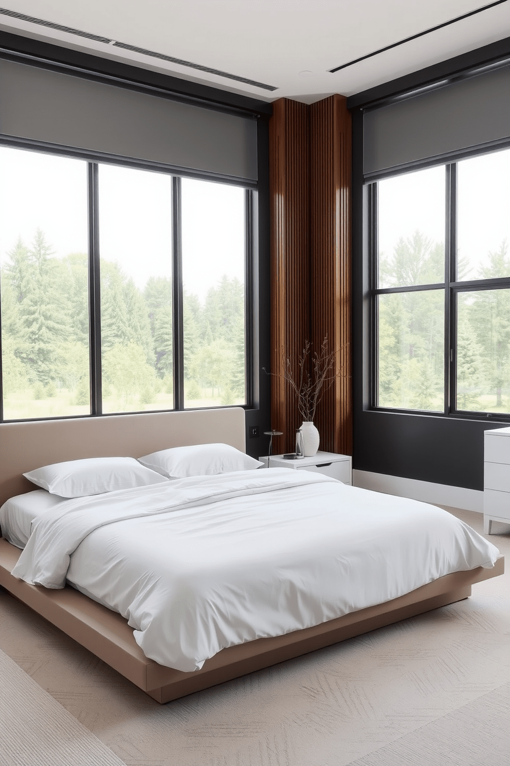 A serene king bedroom featuring minimalist design elements. The room includes a low-profile platform bed with a simple headboard and crisp white bedding. Sleek furniture pieces such as a streamlined nightstand and a modern dresser complement the space. Large windows allow natural light to flood the room, enhancing the calm atmosphere.