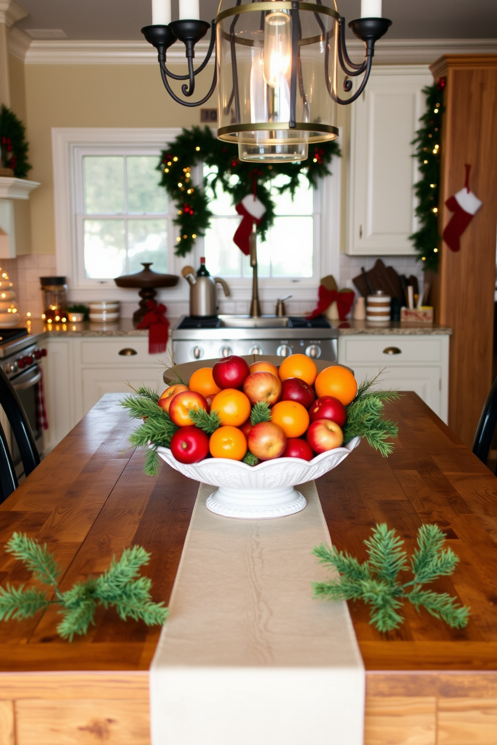 A cozy kitchen setting adorned for Christmas. A large wooden table is centered with a beautiful bowl filled with seasonal fruits like oranges, apples, and pomegranates, surrounded by festive decorations such as twinkling lights and evergreen garlands.