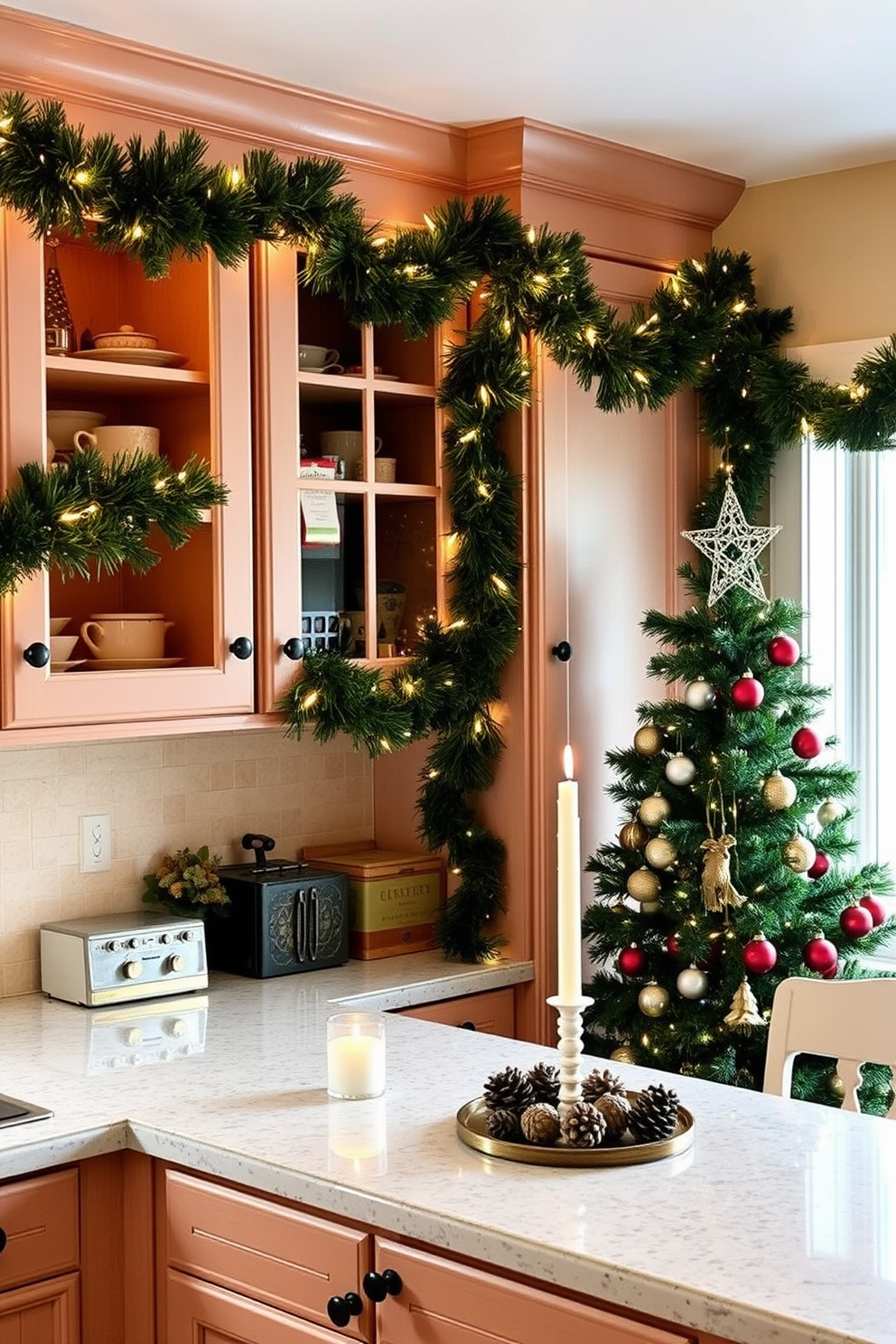 A cozy kitchen adorned for Christmas with garlands draped elegantly across open shelves and cabinets. The garlands are lush and green, interspersed with twinkling fairy lights and small ornaments that add a festive touch. On the countertop, a festive arrangement of pinecones and candles creates a warm ambiance. A beautifully decorated Christmas tree stands in the corner, complementing the cheerful holiday spirit of the kitchen.