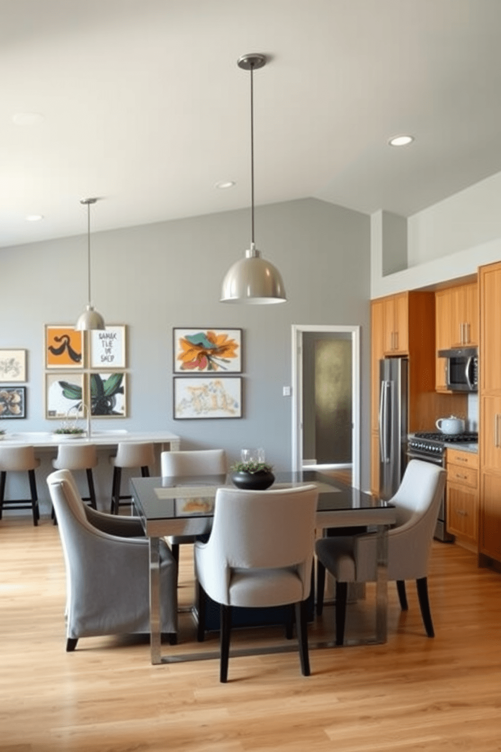 A modern kitchen dining room combo featuring a sleek island with bar stools. The walls are painted in a soft gray tone, complemented by warm wood cabinetry and stainless steel appliances. A large dining table sits in the center, surrounded by upholstered chairs in a neutral fabric. Pendant lights hang above the table, creating an inviting atmosphere for family meals and gatherings. Artwork adorns the walls, showcasing vibrant colors that reflect the personality of the space. A mix of framed prints and abstract pieces adds character and warmth to the overall design.