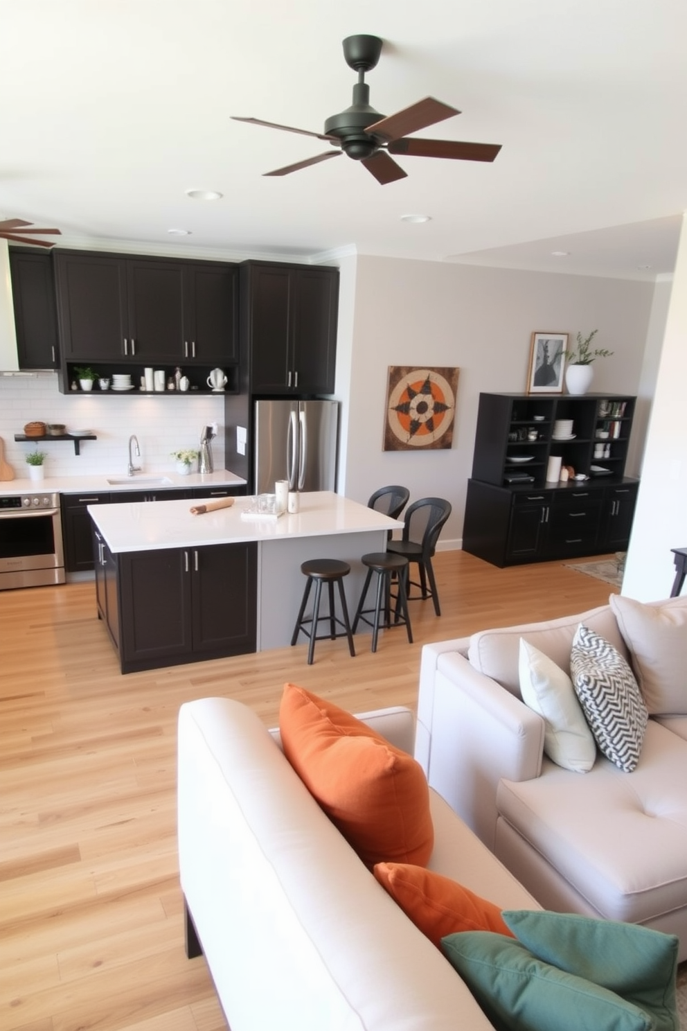 A functional kitchen and family room combo that promotes easy movement and interaction. The kitchen features an island with seating, modern appliances, and open shelving, seamlessly connecting to the cozy family room with a large sectional sofa and a coffee table.