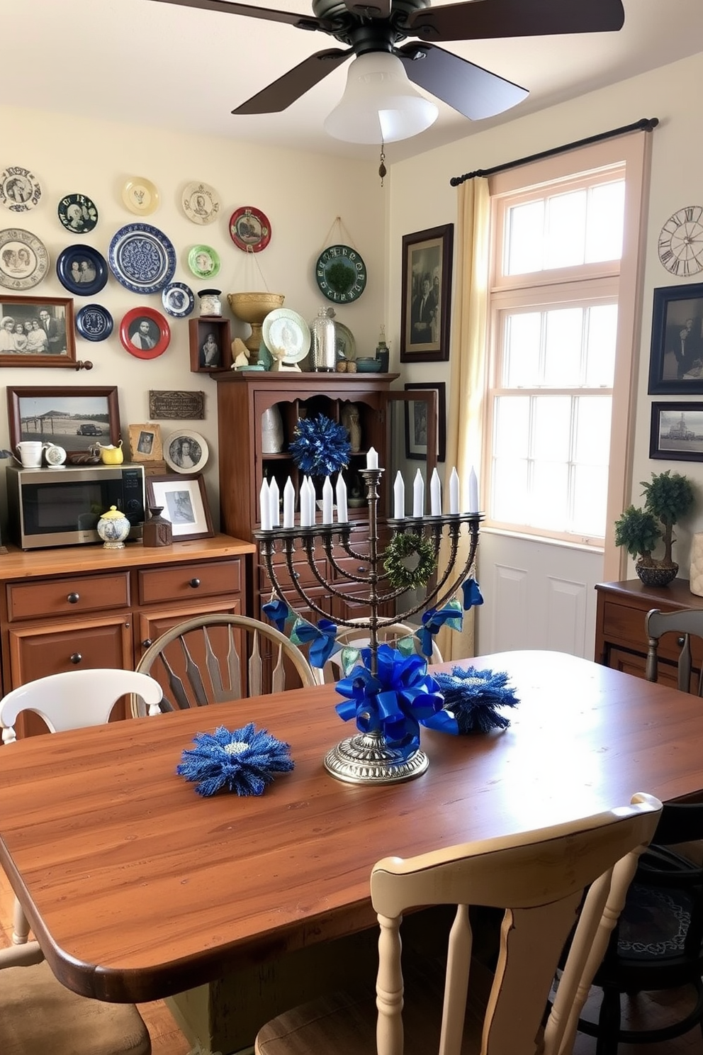 A warm and inviting kitchen adorned with family heirloom decorations. The space features a rustic wooden dining table surrounded by mismatched chairs, each telling its own story. On the walls, vintage plates and framed family photos create a nostalgic atmosphere. A festive Hanukkah menorah sits prominently on the countertop, surrounded by blue and silver decorations that enhance the holiday spirit.