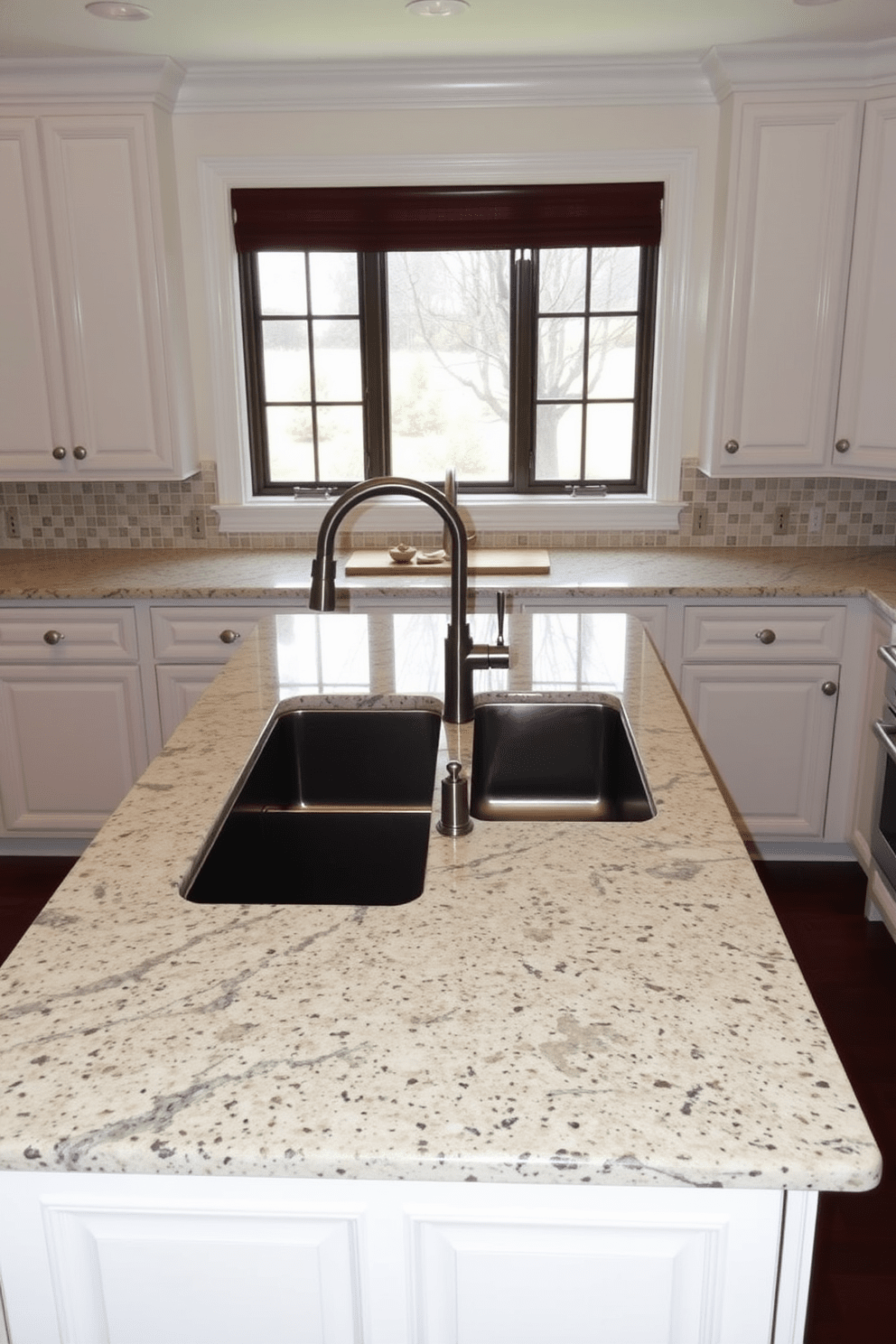 A spacious family kitchen features a large rectangular sink positioned centrally on a beautiful granite countertop. The sink is complemented by a stylish pull-down faucet and surrounded by ample workspace for meal preparation. Above the sink, a large window allows natural light to flood the area, creating a bright and inviting atmosphere. The cabinetry is painted in a soft white, contrasting beautifully with the dark wood floor, enhancing the overall aesthetic of the kitchen.