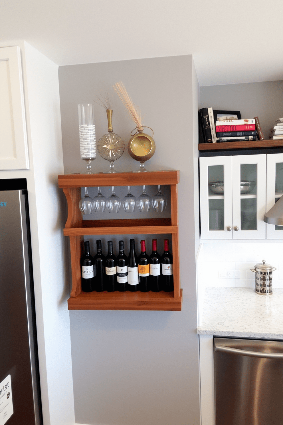 A stylish wall-mounted wine rack is elegantly displayed in a kitchen, showcasing a variety of wine bottles and glasses. The rack is crafted from reclaimed wood, adding warmth and character to the modern kitchen space. The kitchen walls are painted in a soft gray hue, complemented by white cabinetry and sleek stainless steel appliances. Accent shelves above the wine rack display decorative items and cookbooks, enhancing the overall aesthetic of the kitchen.