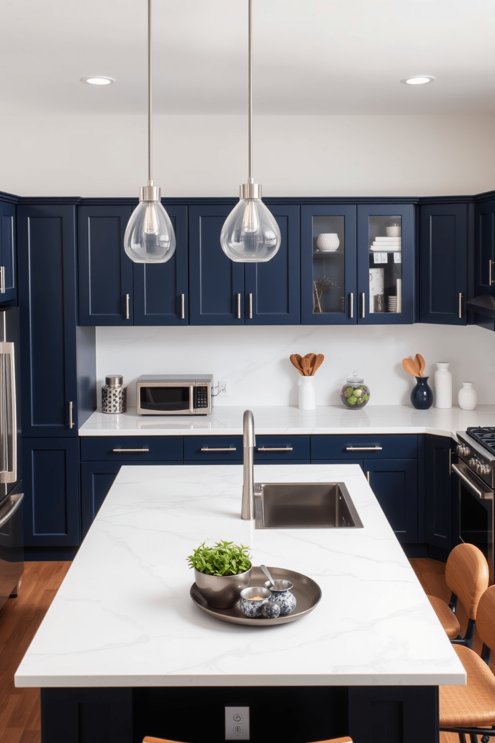 A multi-functional island features a spacious prep area with sleek quartz countertops and comfortable bar seating. The island is surrounded by an L-shaped kitchen layout, showcasing modern cabinetry in a rich navy blue finish and stainless steel appliances.